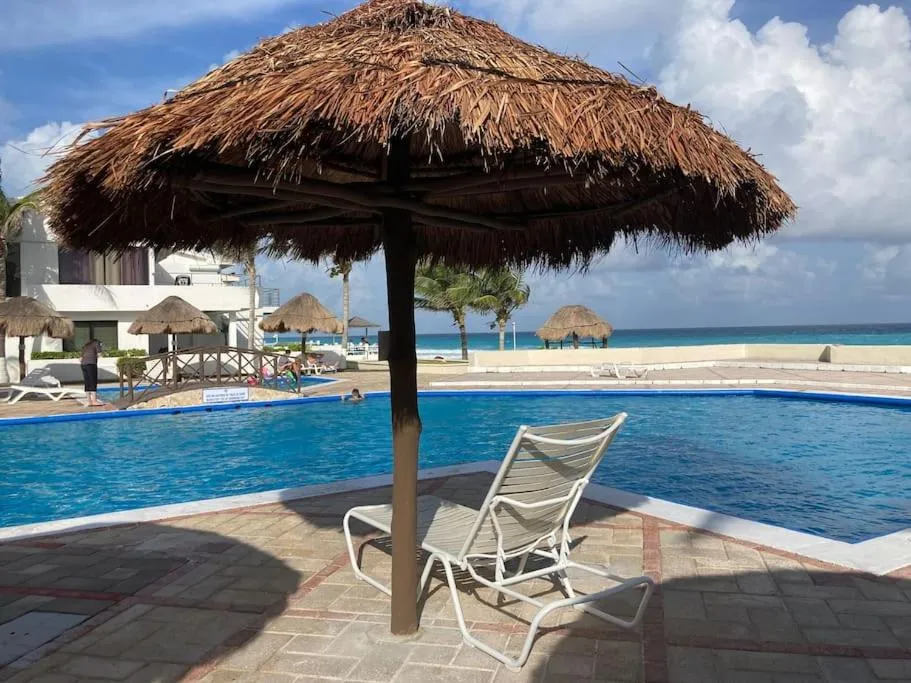 Swimming pool in Cancun Oceanfront, Entire Apartment