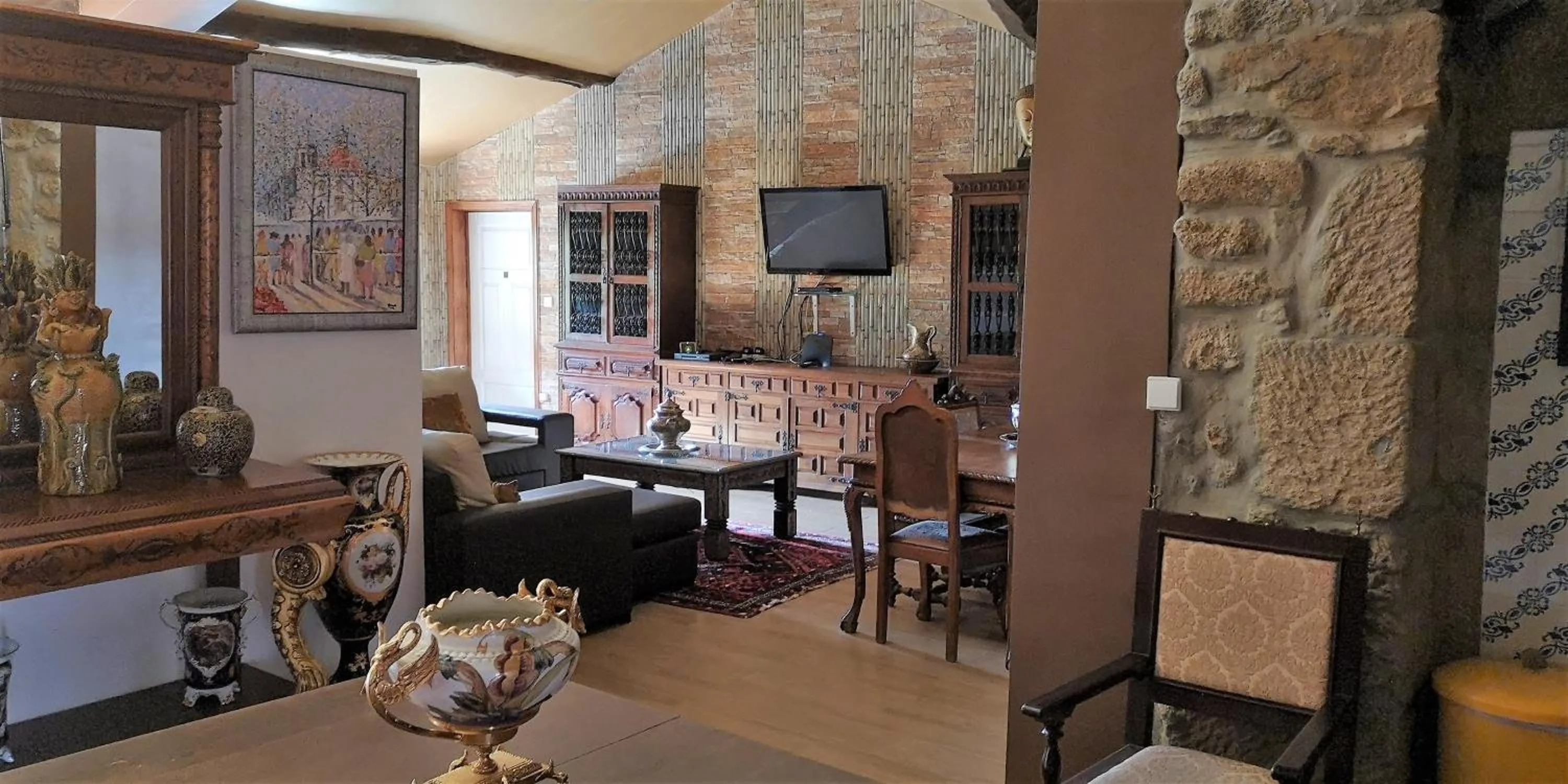 Communal lounge/ TV room in Gojim Casa Rural