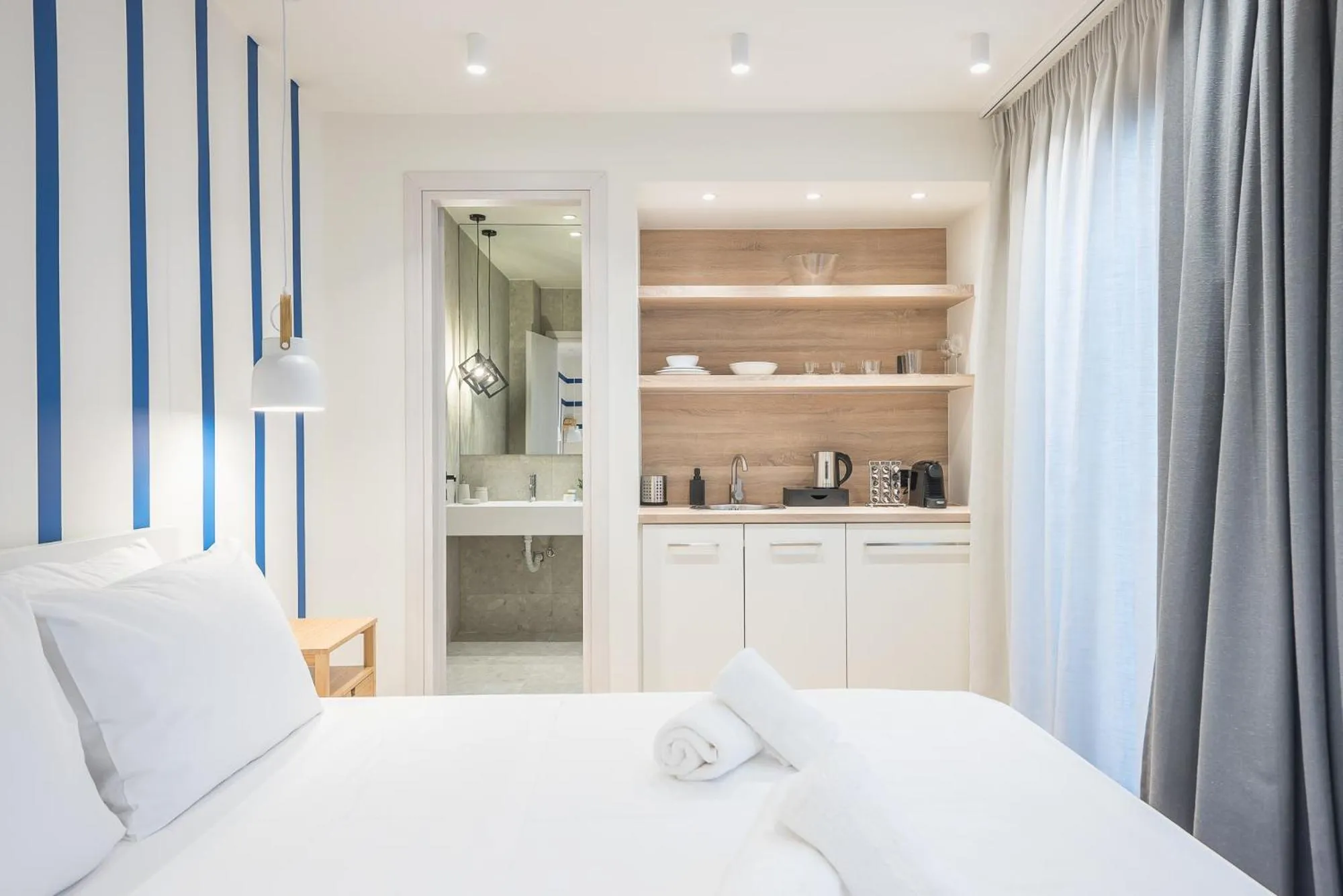 Bed in The Asprogeraka - self check-in rooms