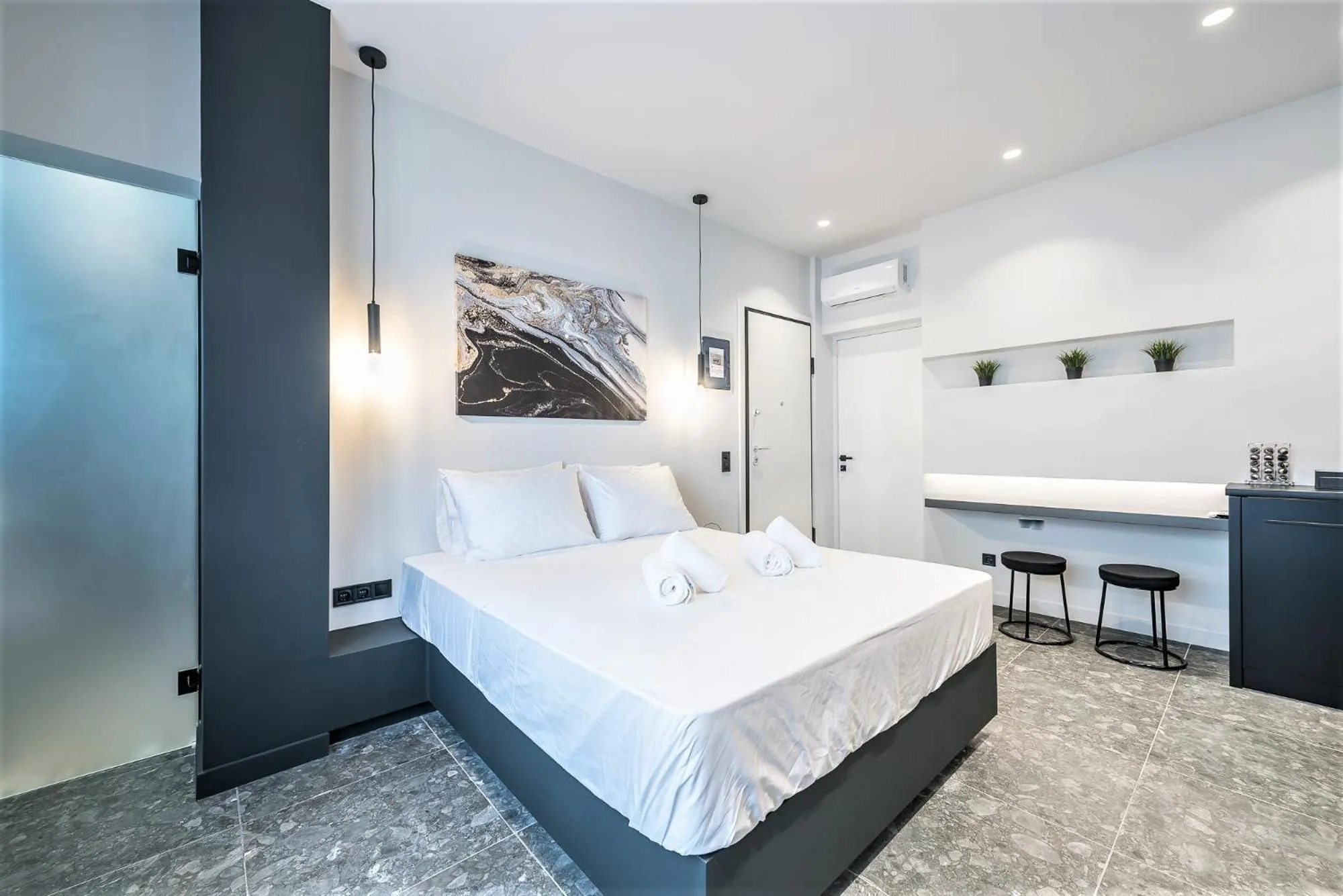 Bed in The Asprogeraka - self check-in rooms