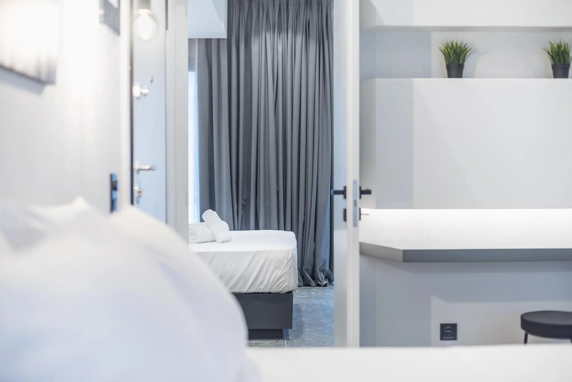 Bed in The Asprogeraka - self check-in rooms