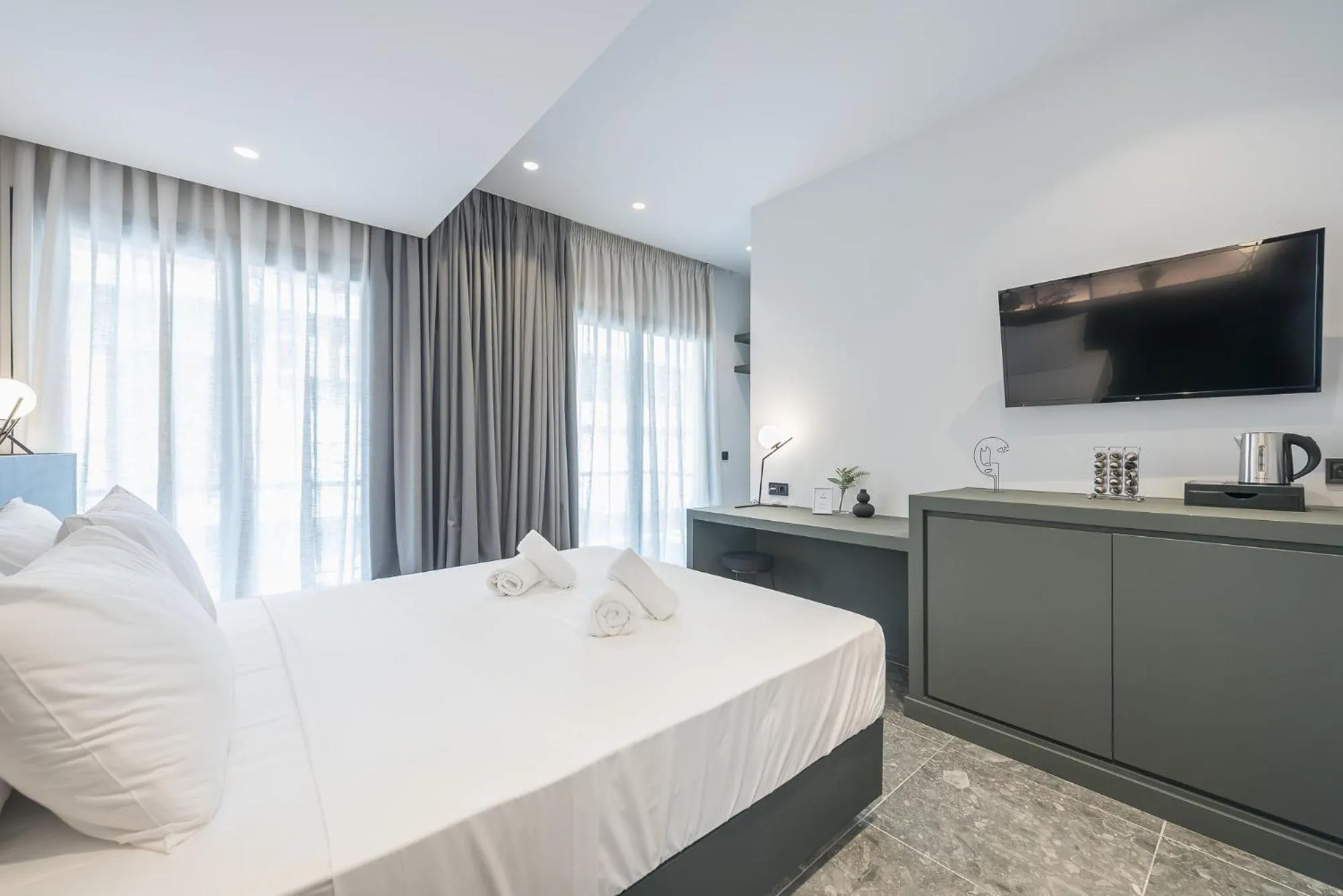 Bed in The Asprogeraka - self check-in rooms