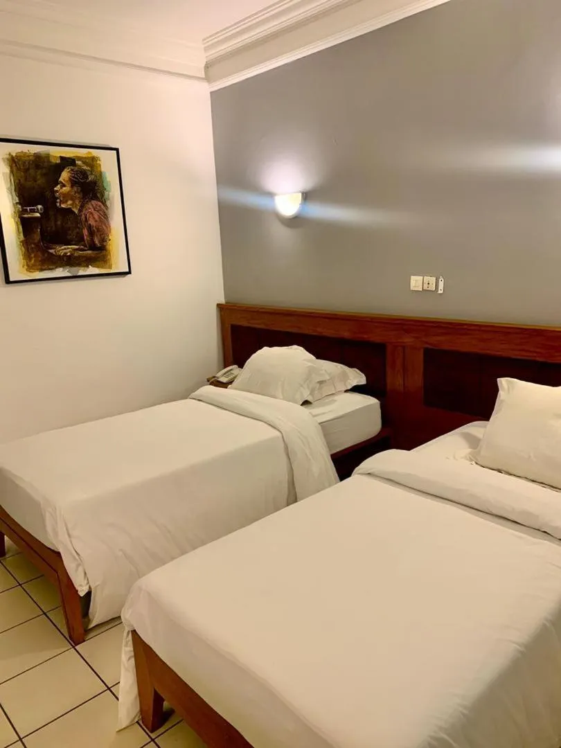 Bed in Futuris Hotel