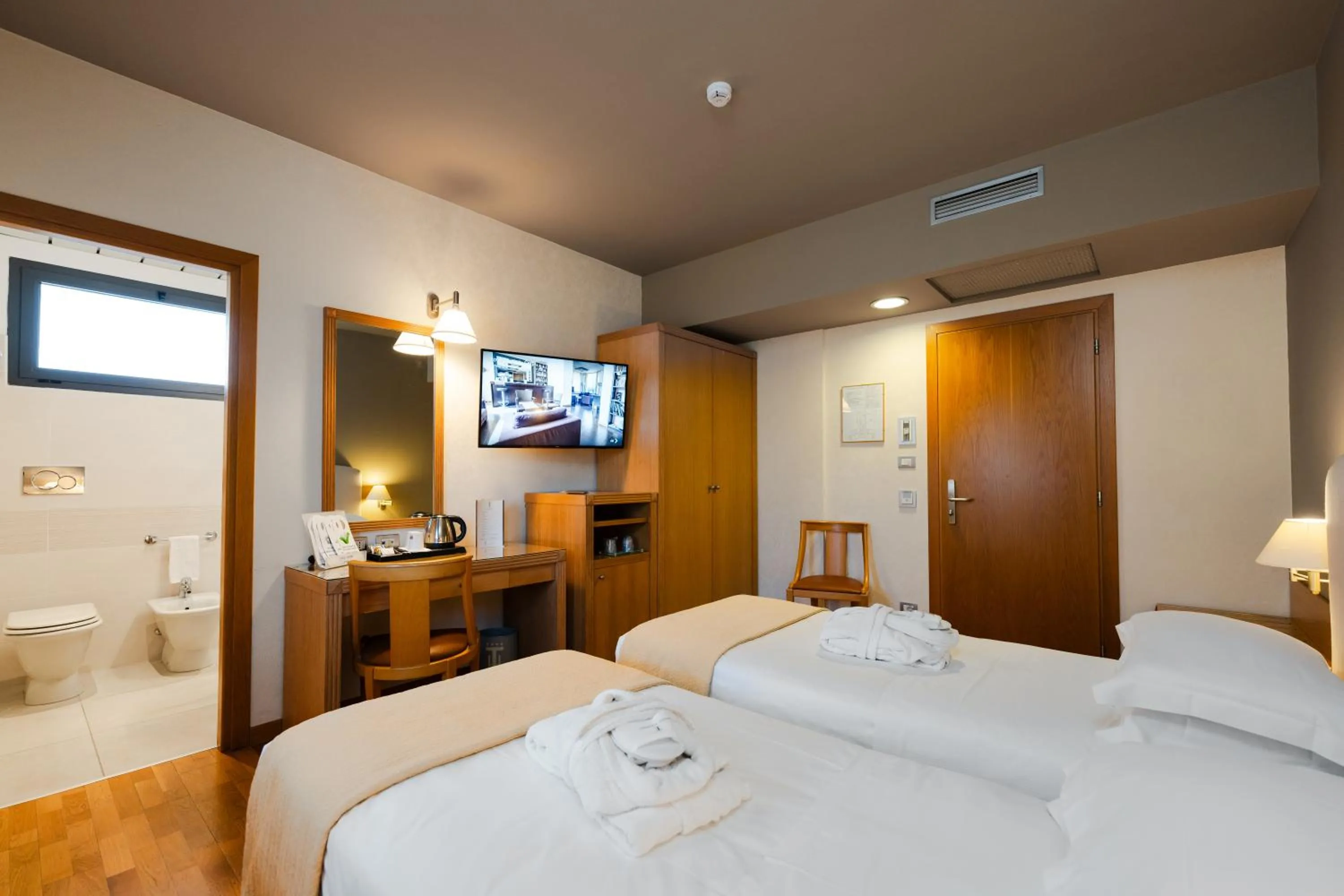 Bed in Hotel Touring