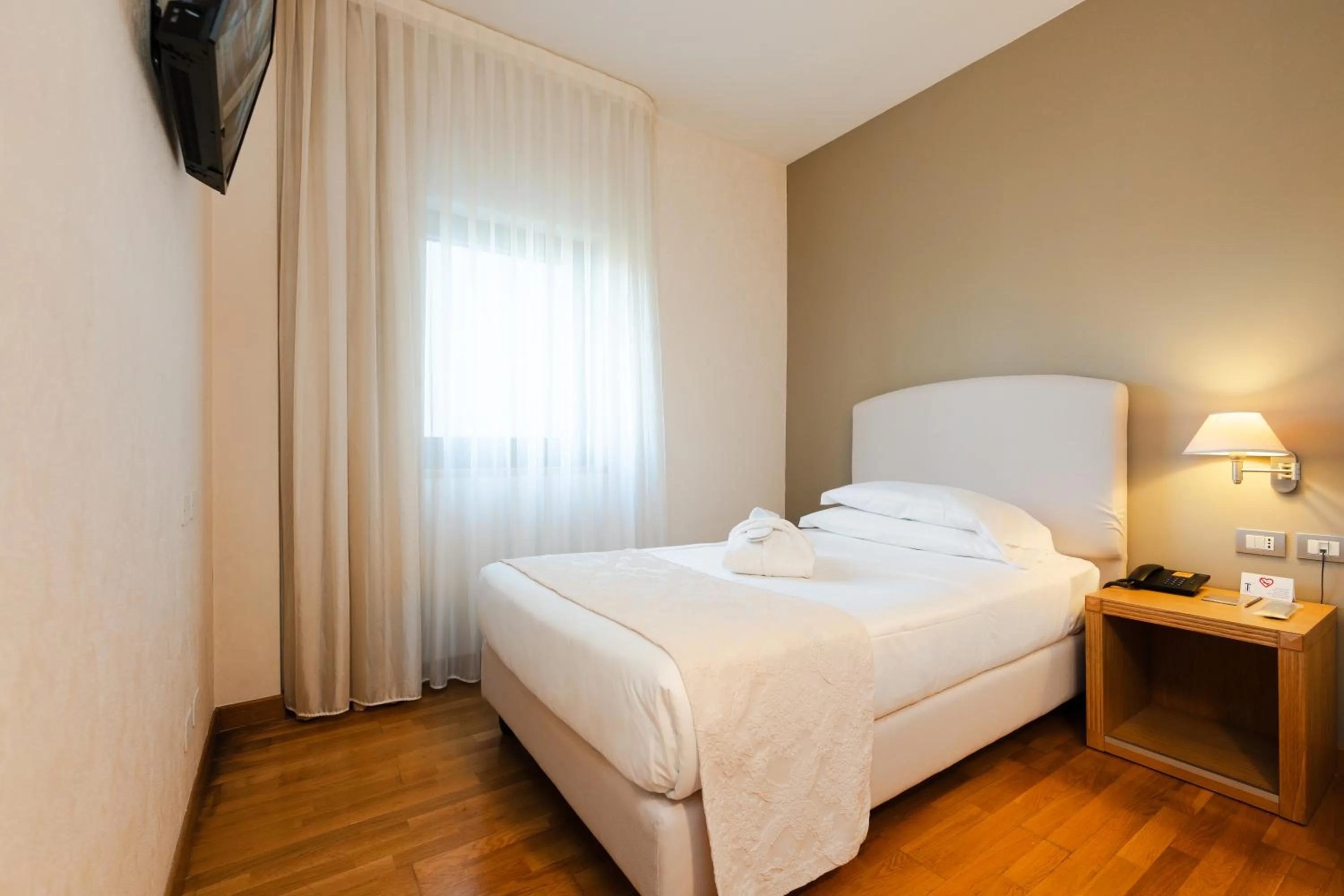 Bed in Hotel Touring