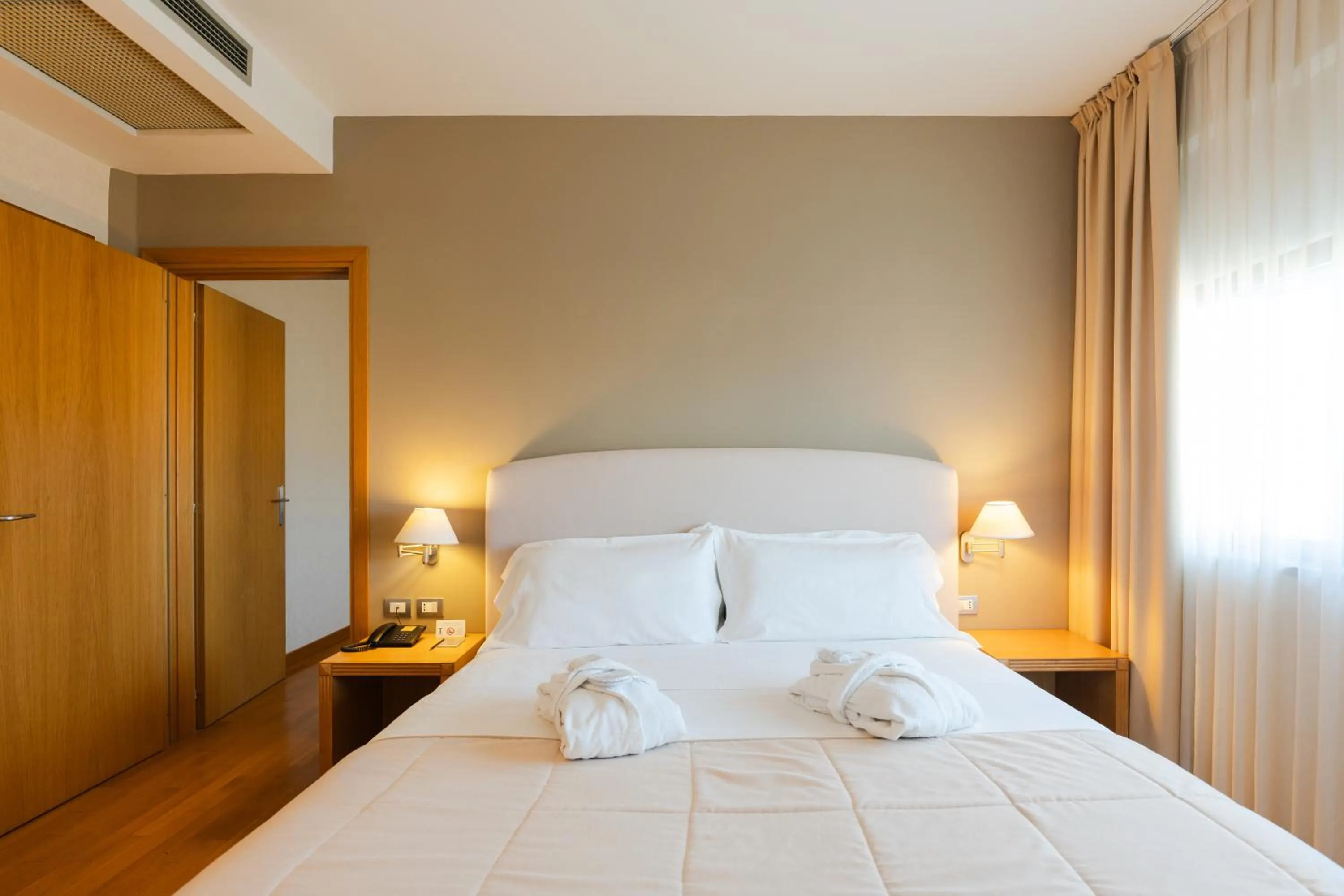 Bed in Hotel Touring