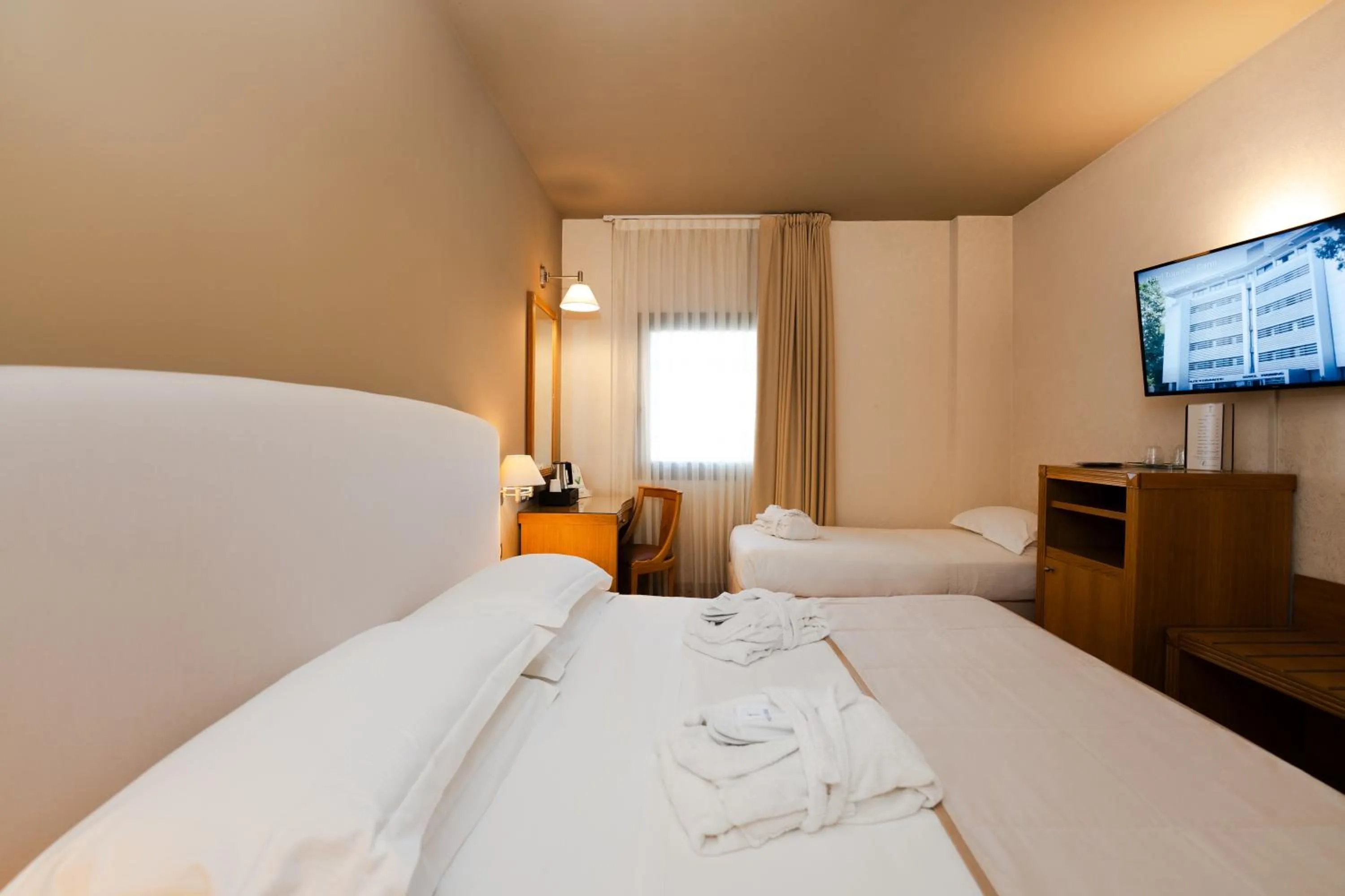 Bed in Hotel Touring