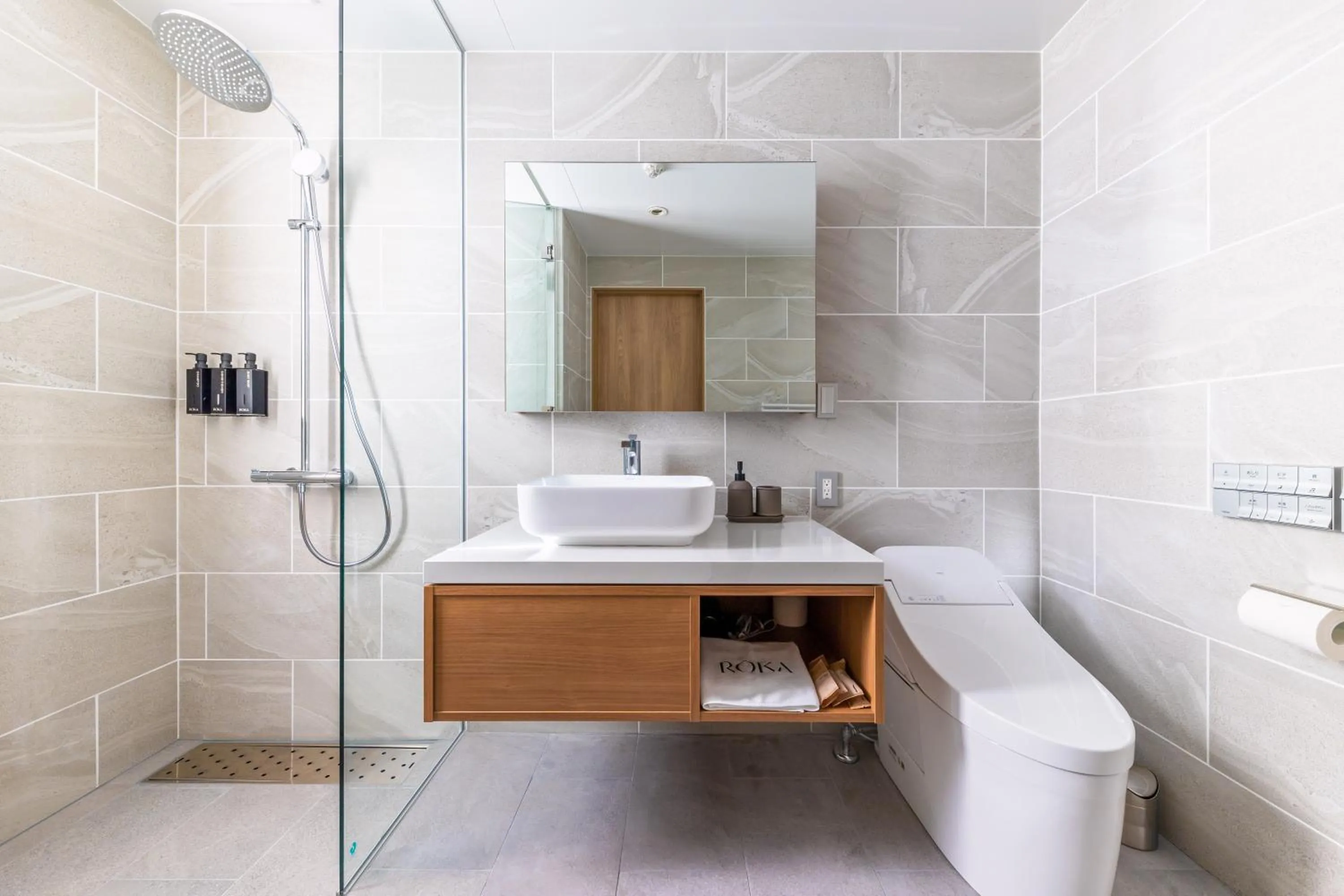 Bathroom in ROKA by HHG