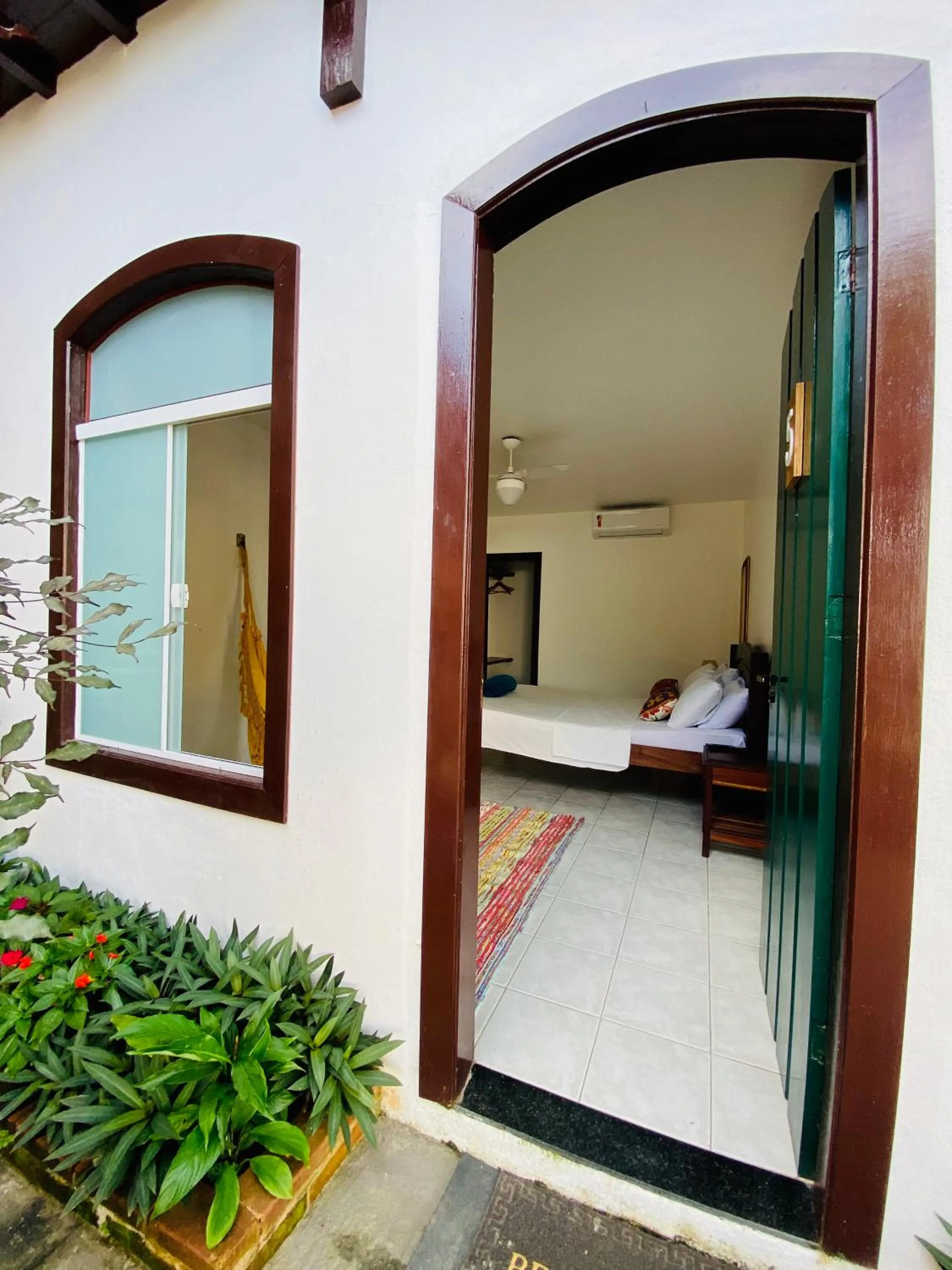 Bed in Casa Aldeia Paraty