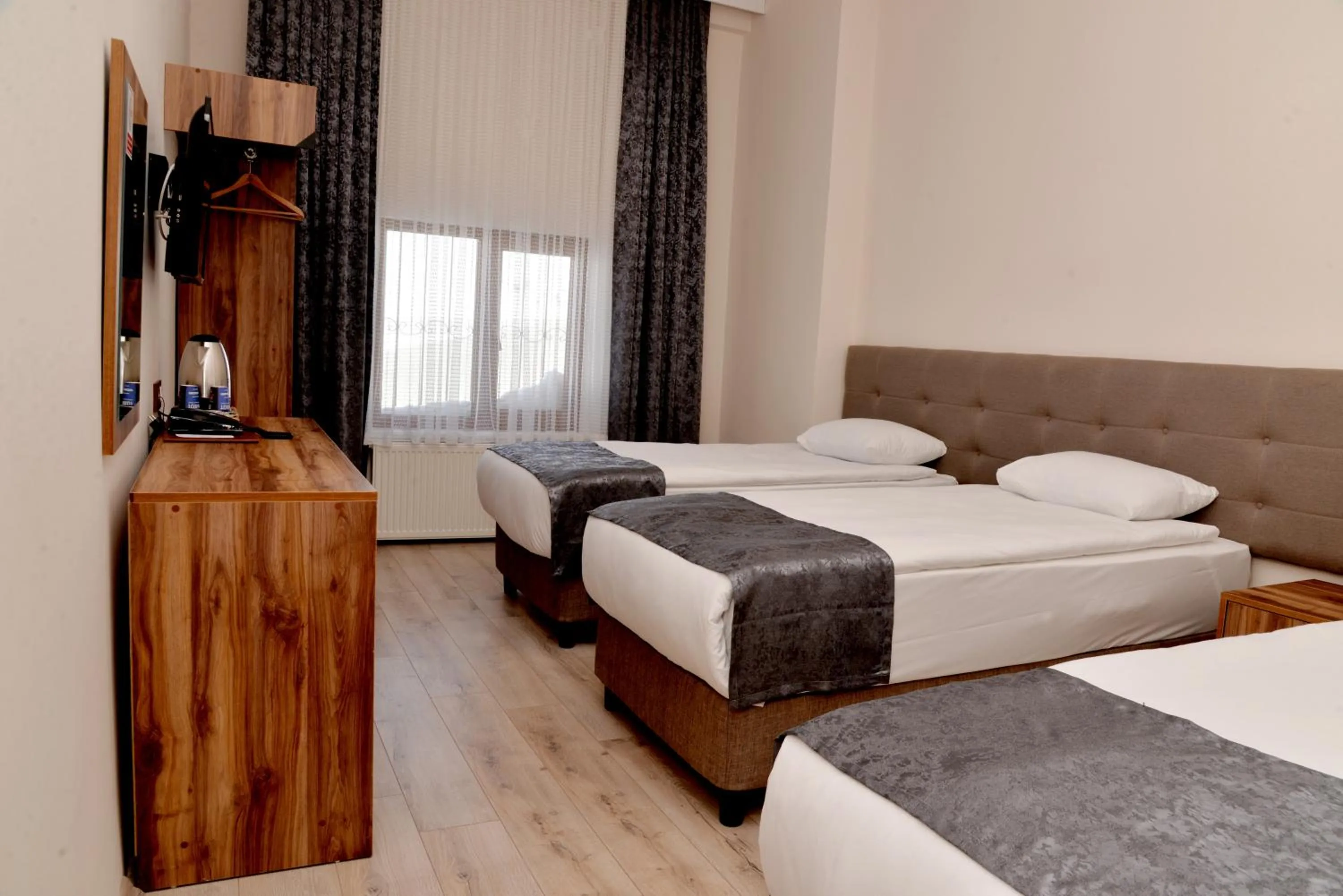 Bed in Zümrüt Palas Otel