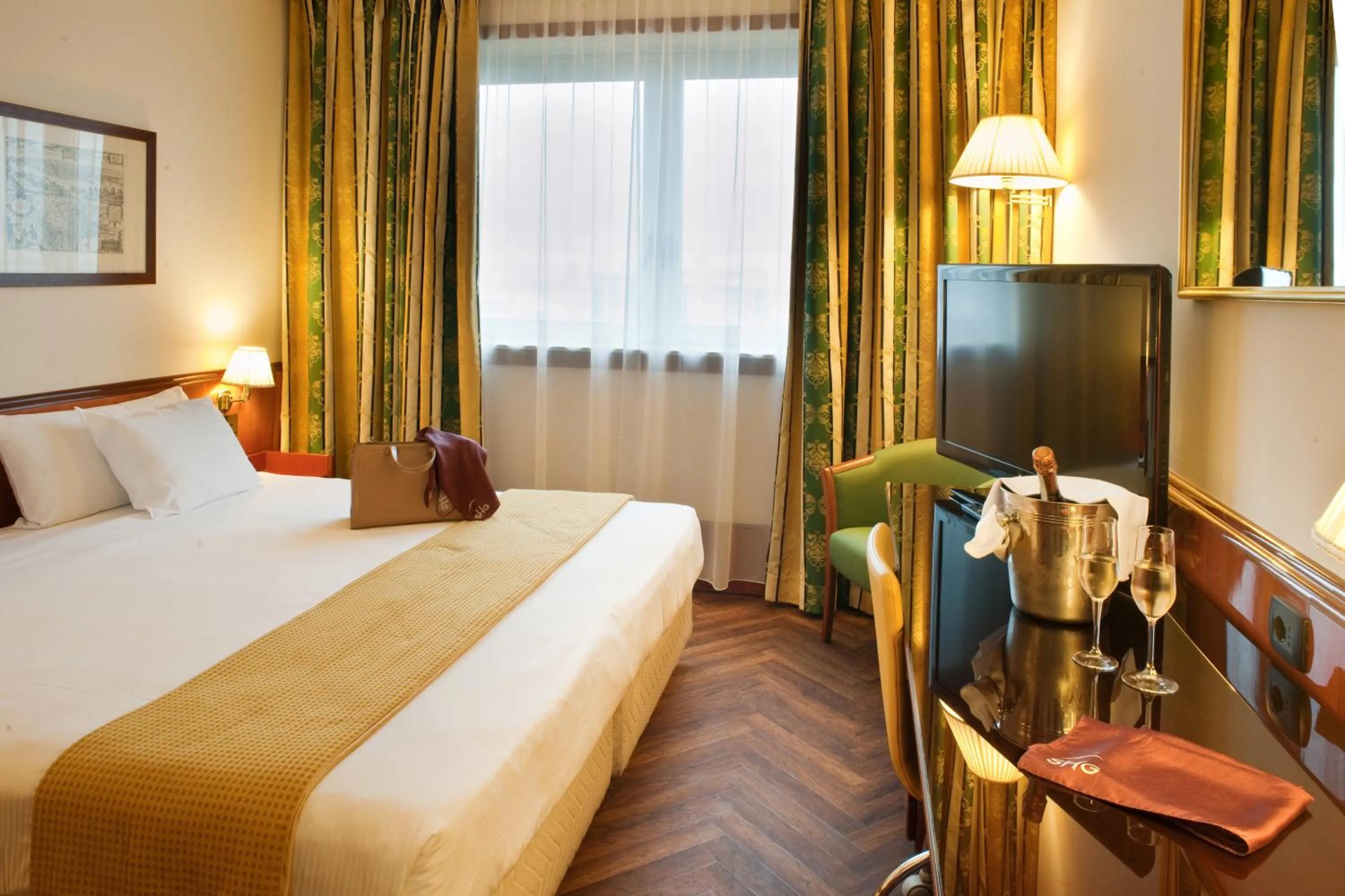 Bed in Hotel Catullo