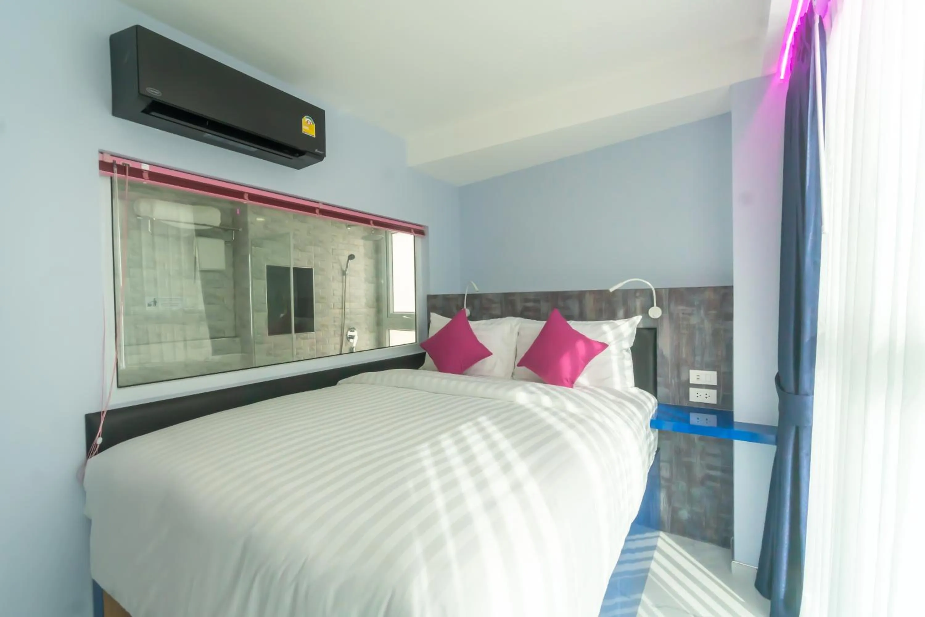 Bedroom, Bed in Spark Hotel - MRT Queen Sirikit - SHA Extra Plus Certified