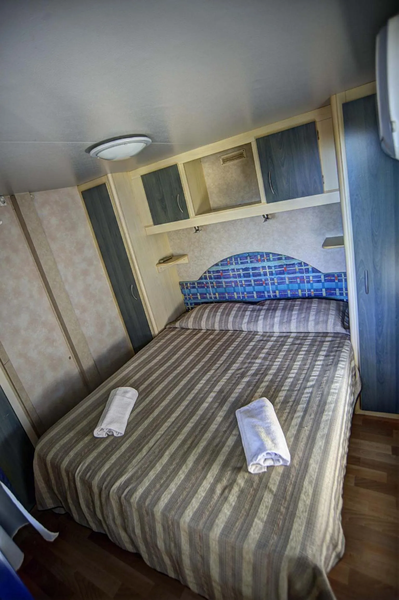 Bed in Flaminio Village Bungalow Park