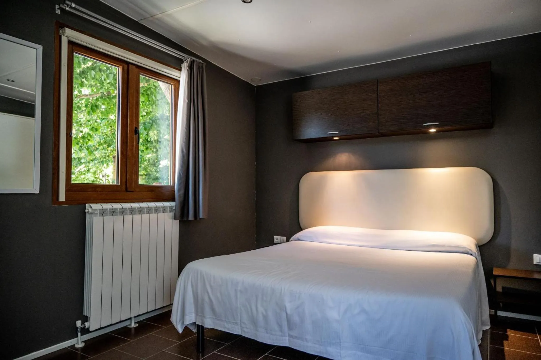 Bed in Flaminio Village Bungalow Park