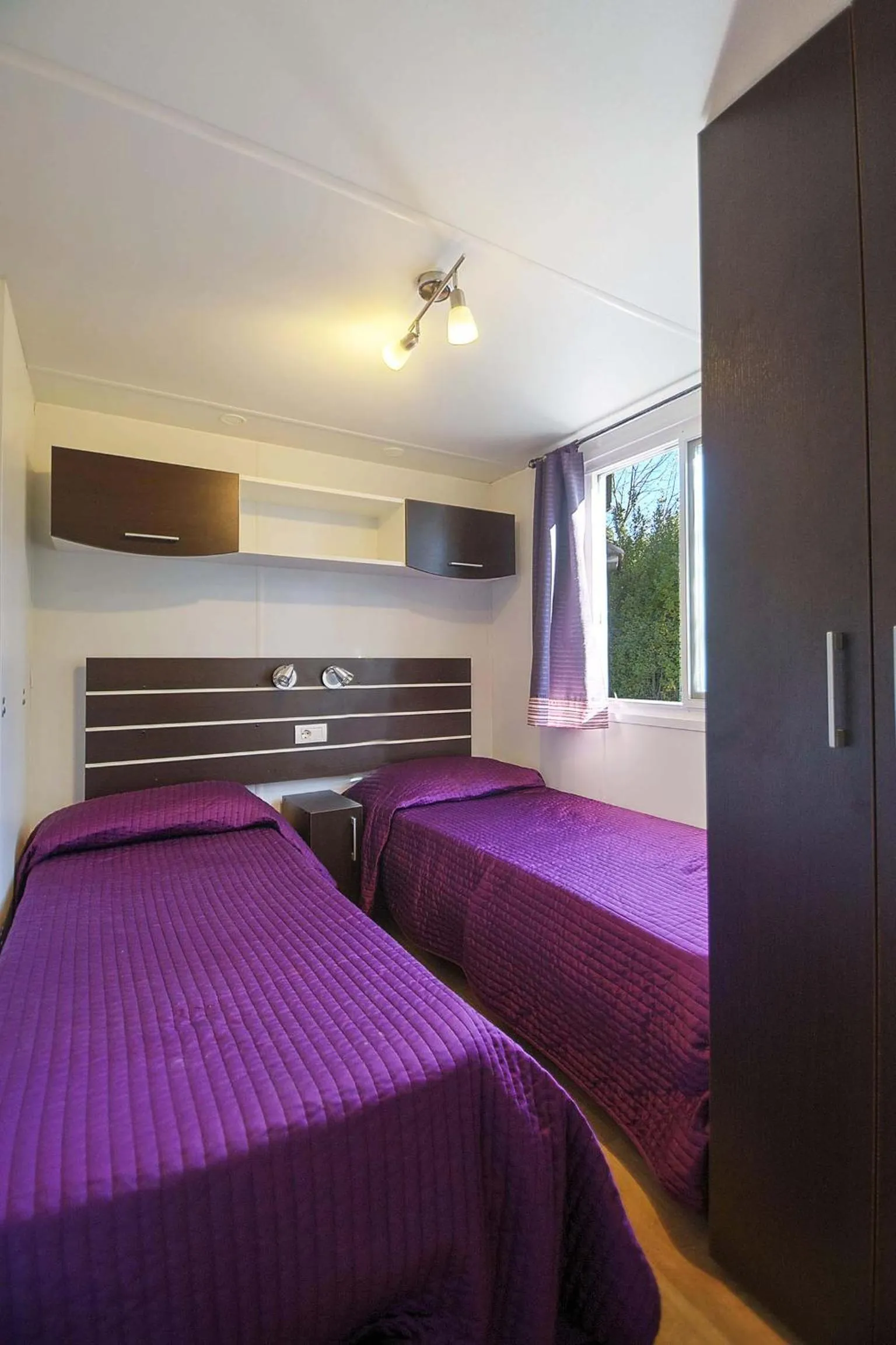 Bed in Flaminio Village Bungalow Park