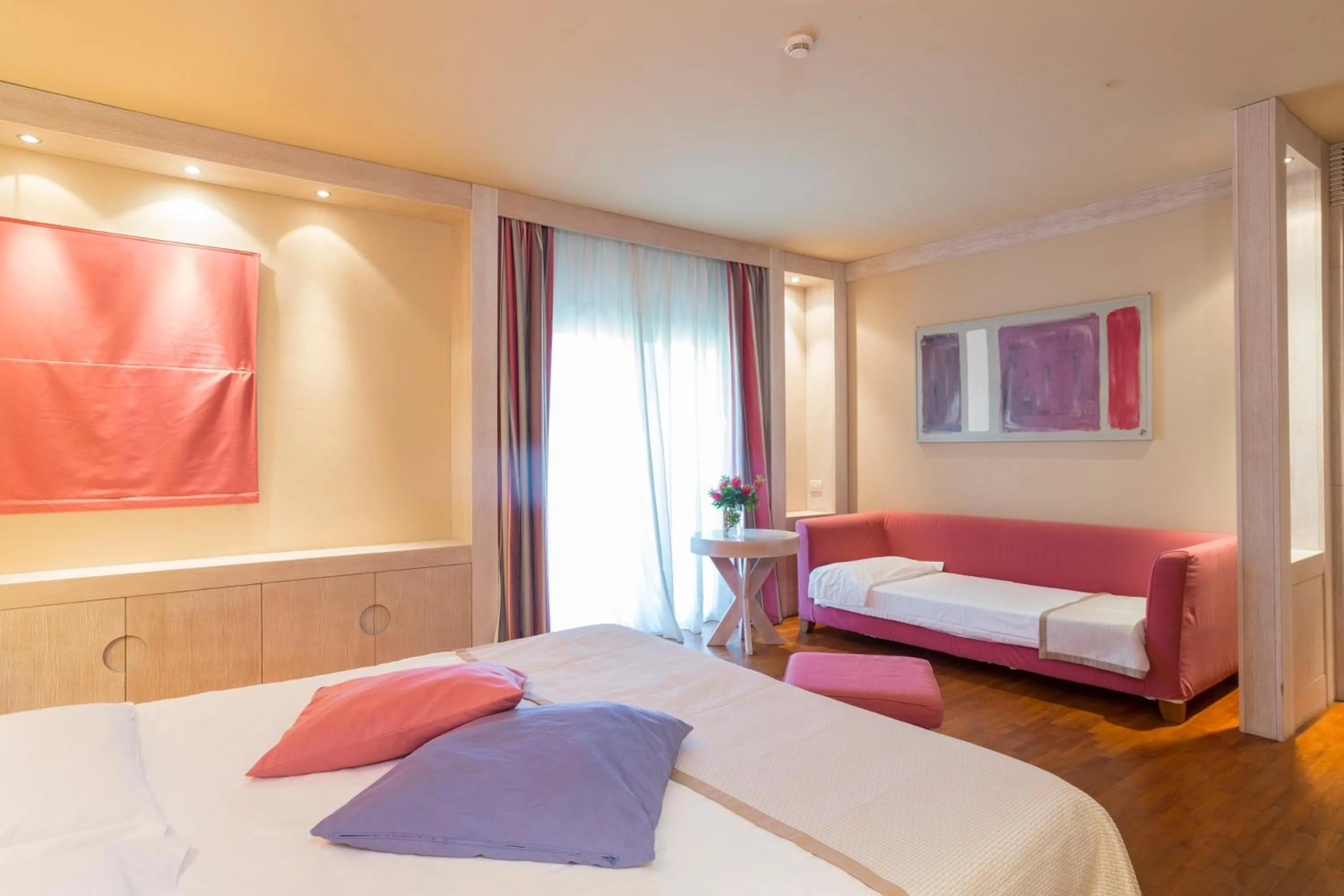 Photo of the whole room, Bed in TH Tirrenia - Green Park Resort