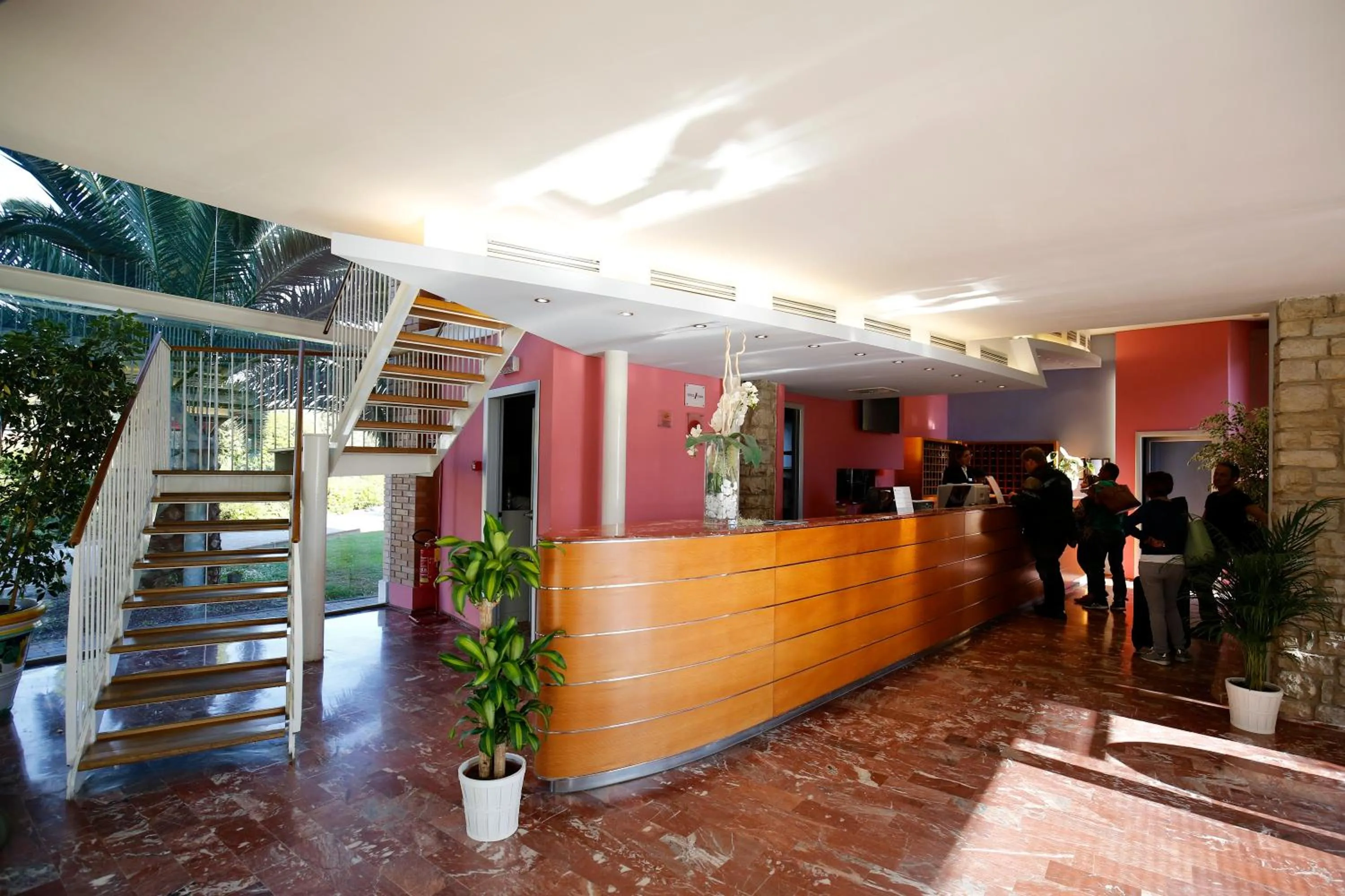 Lobby or reception in TH Tirrenia - Green Park Resort