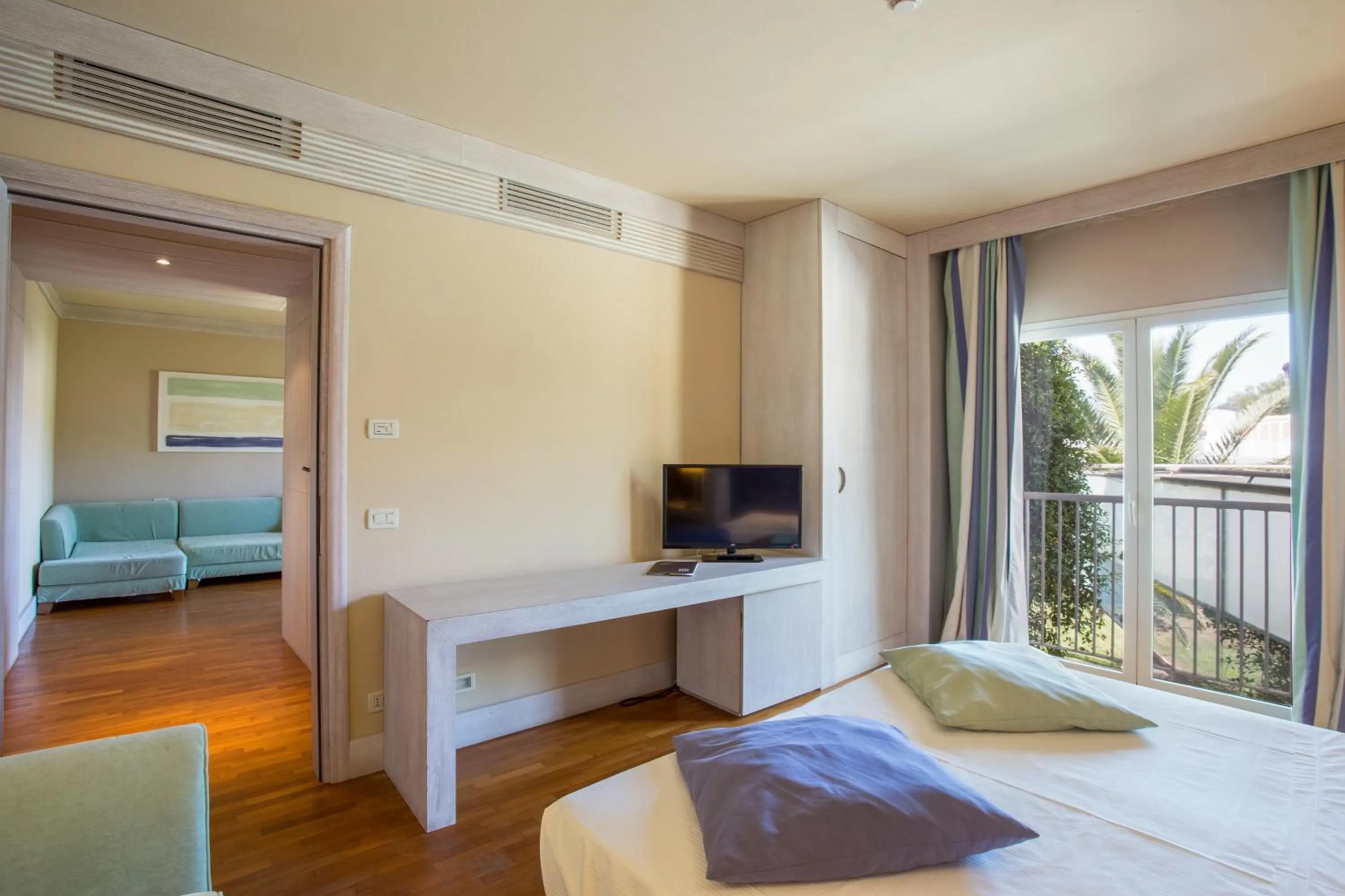 Photo of the whole room, Bed in TH Tirrenia - Green Park Resort