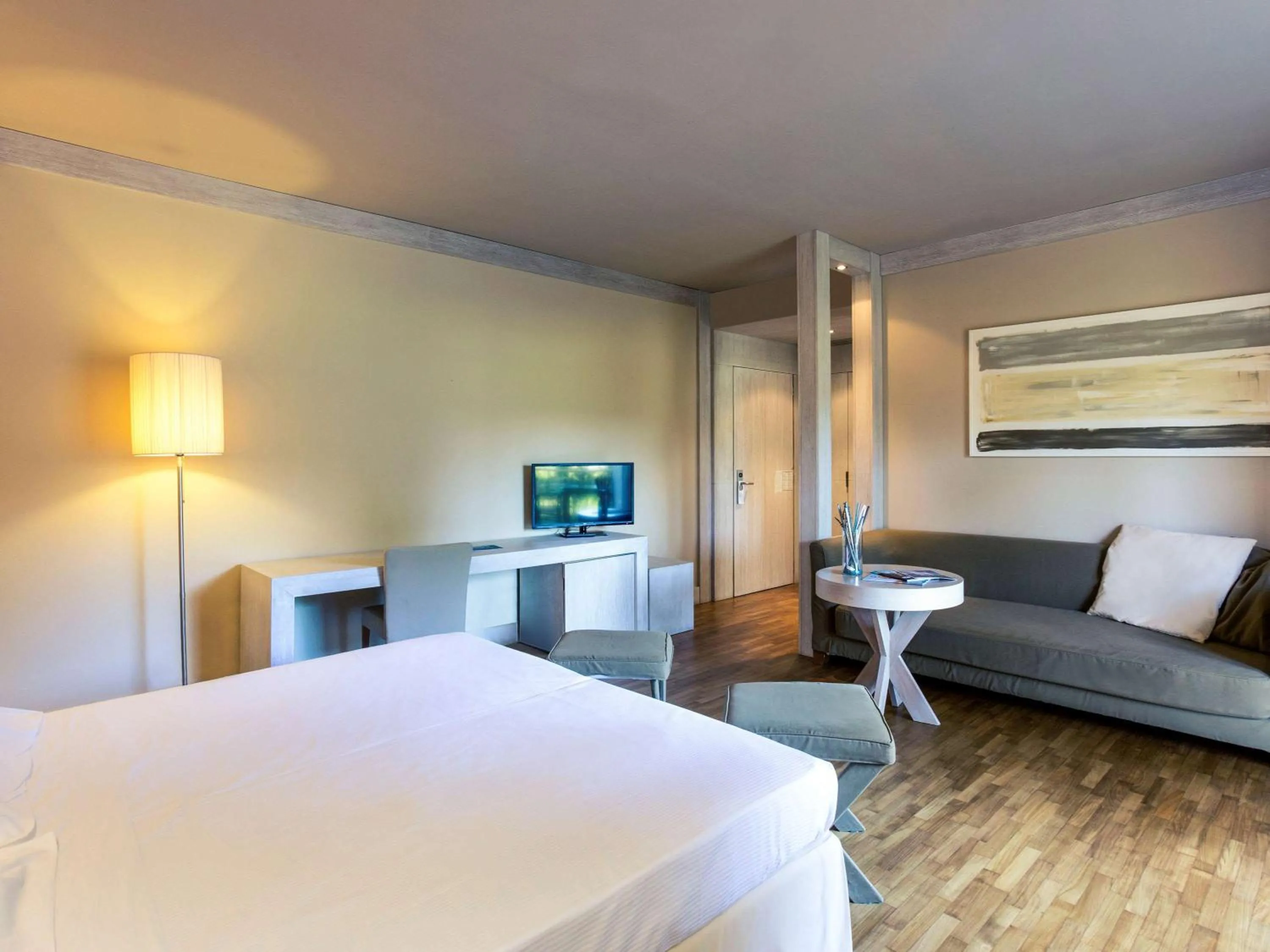 Photo of the whole room, Bed in TH Tirrenia - Green Park Resort