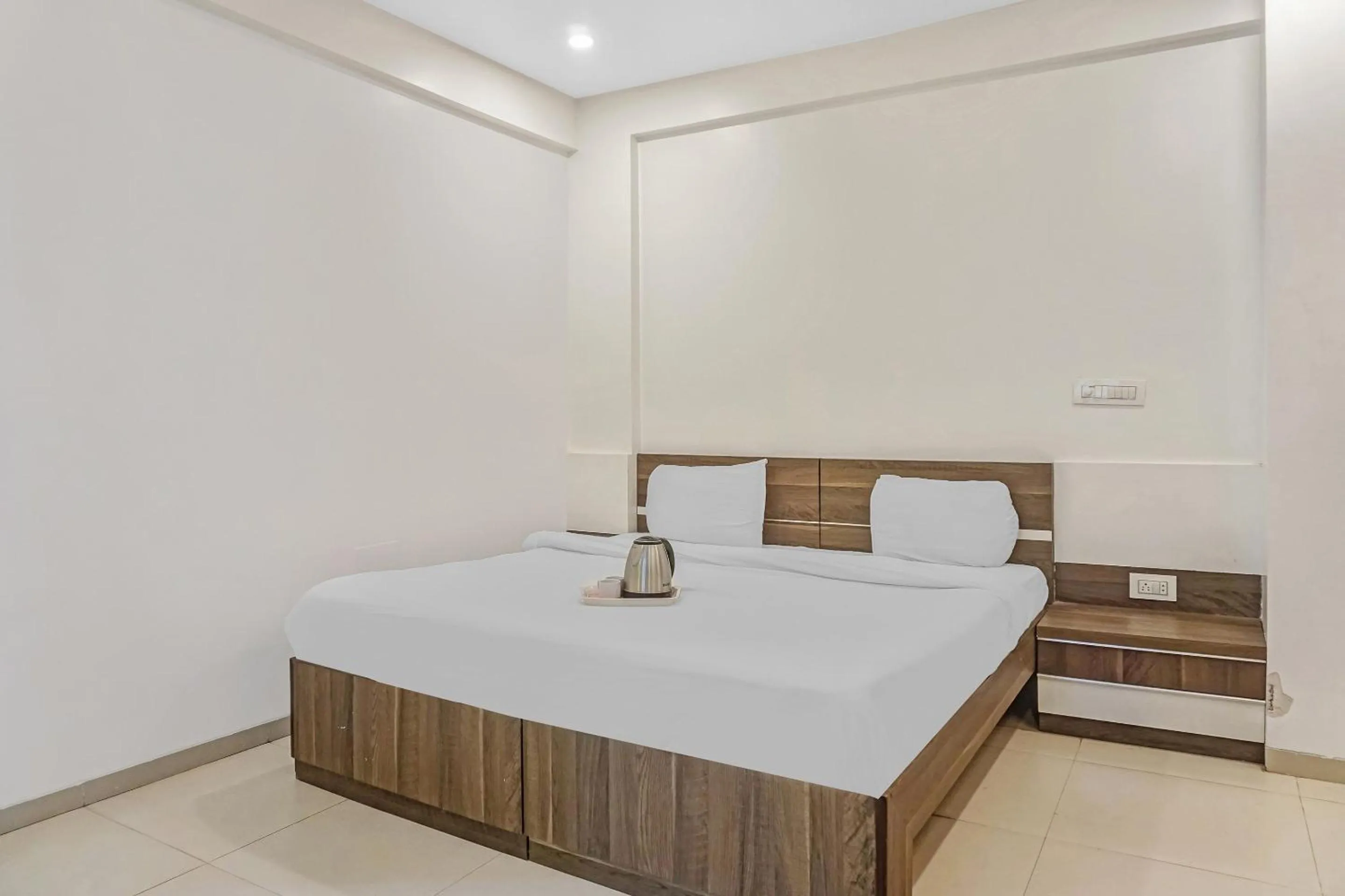 Bedroom, Bed in Super Townhouse The Upper Room Near Pune Airport