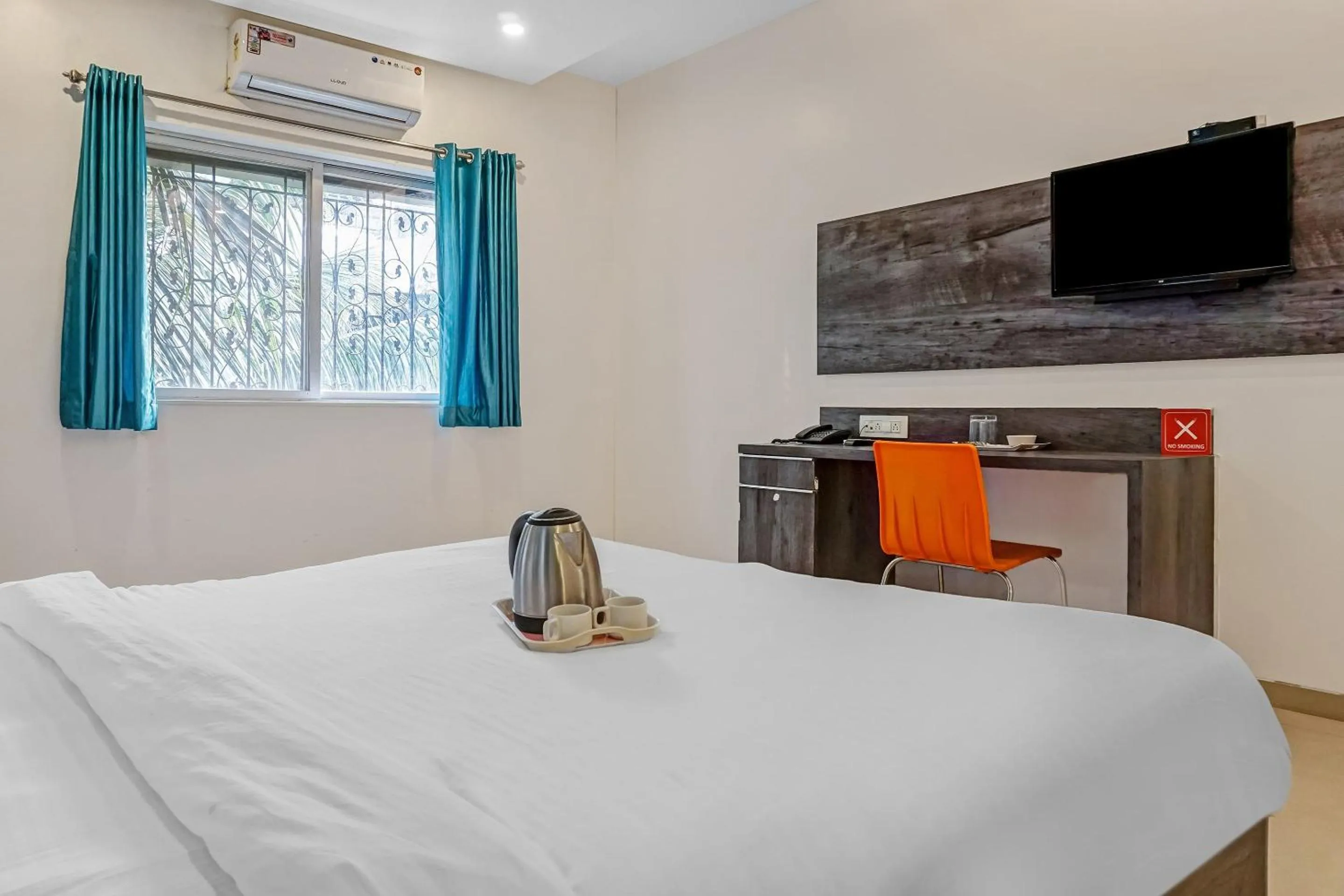Bedroom, Bed in Super Townhouse The Upper Room Near Pune Airport