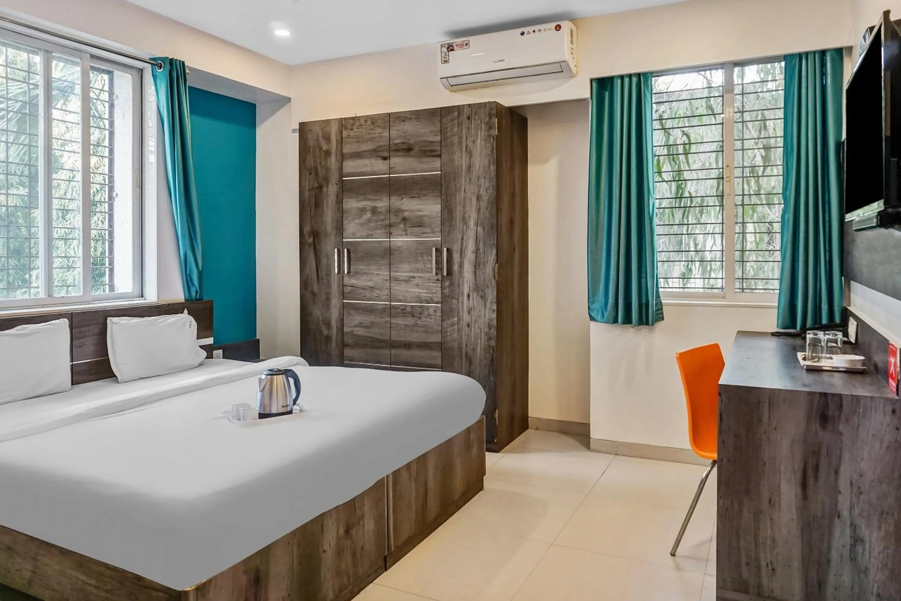 Bedroom, Bed in Super Townhouse The Upper Room Near Pune Airport