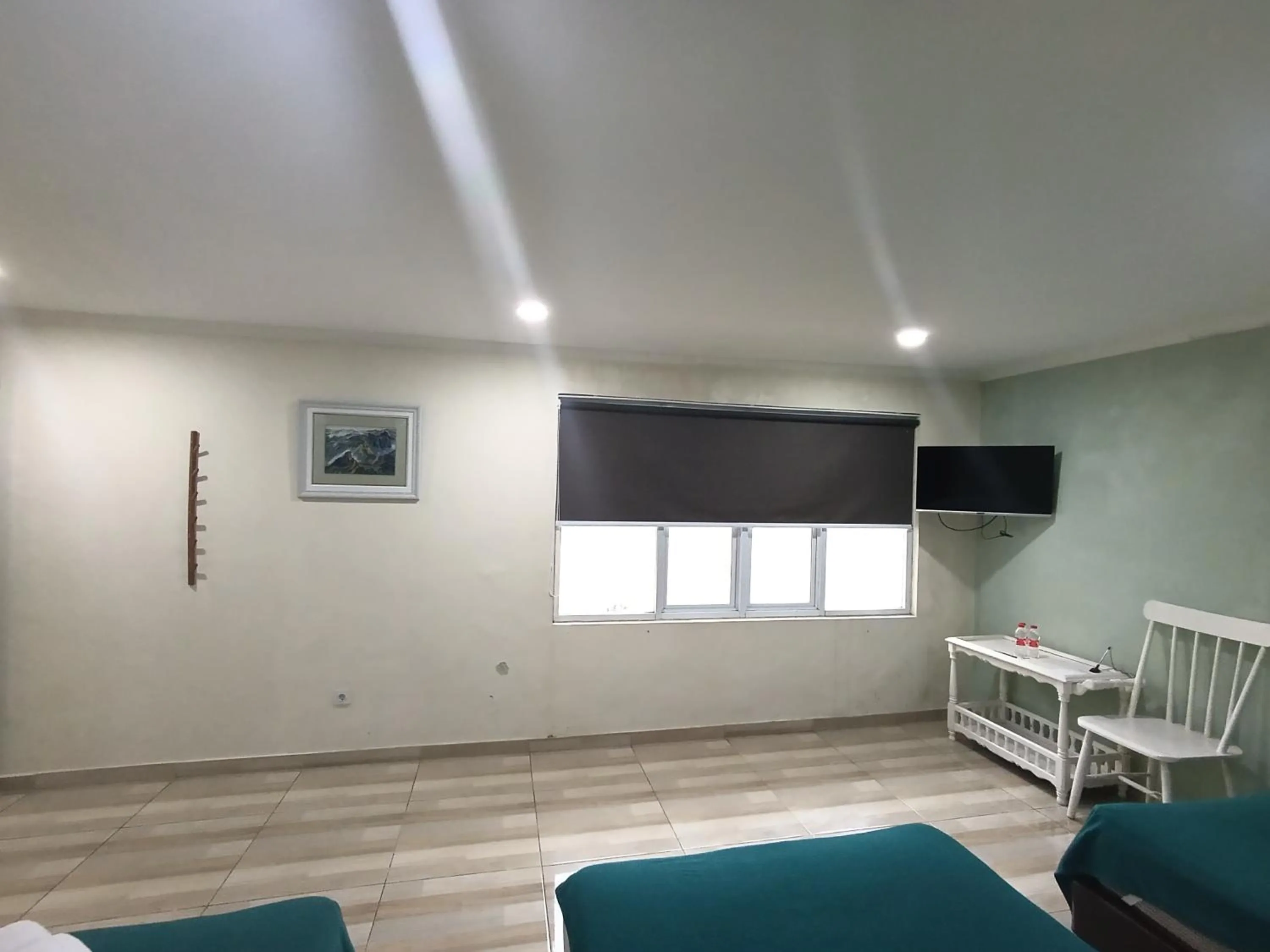 Bed in Mamifokobo Guest House