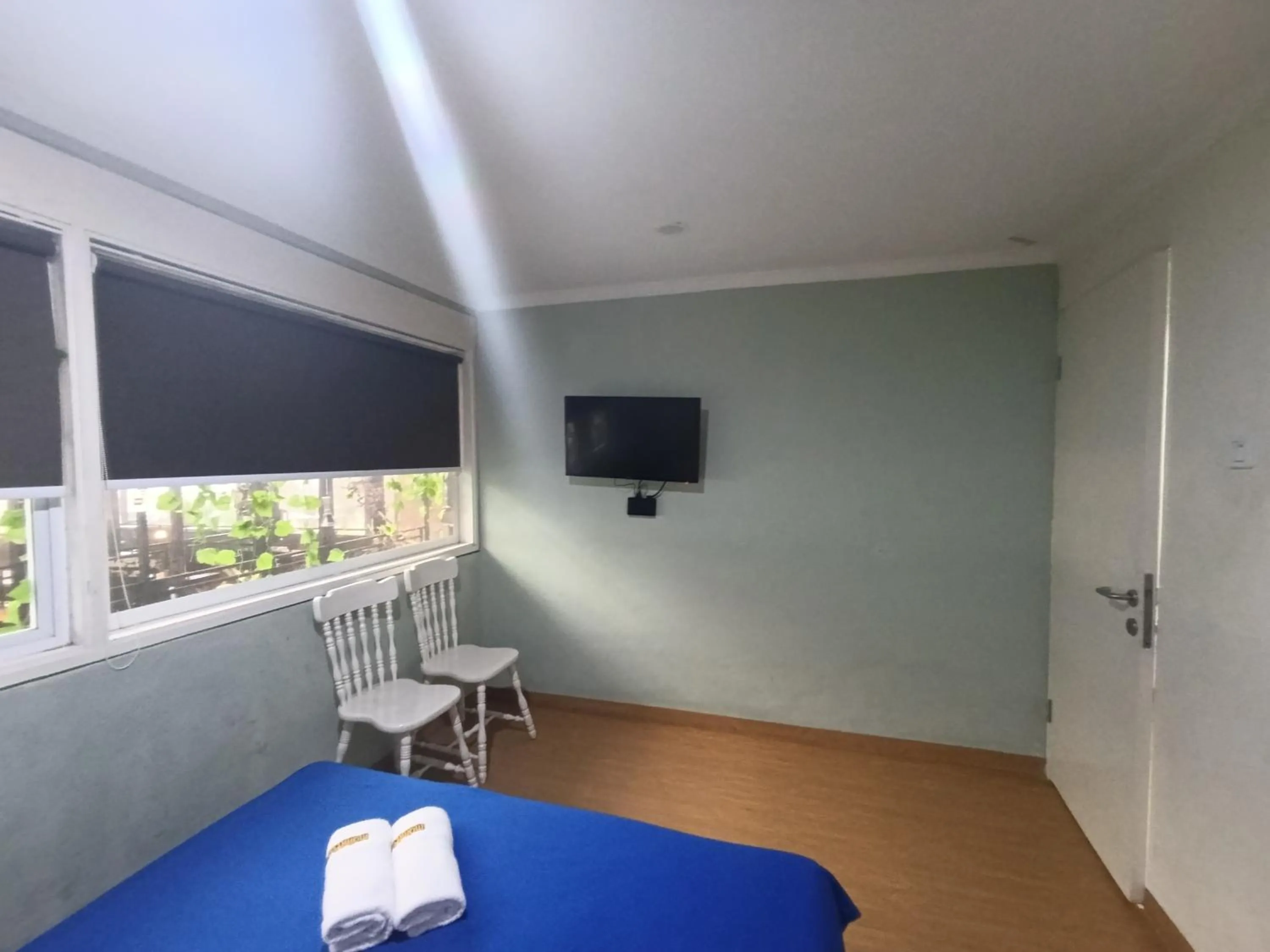 Bed in Mamifokobo Guest House