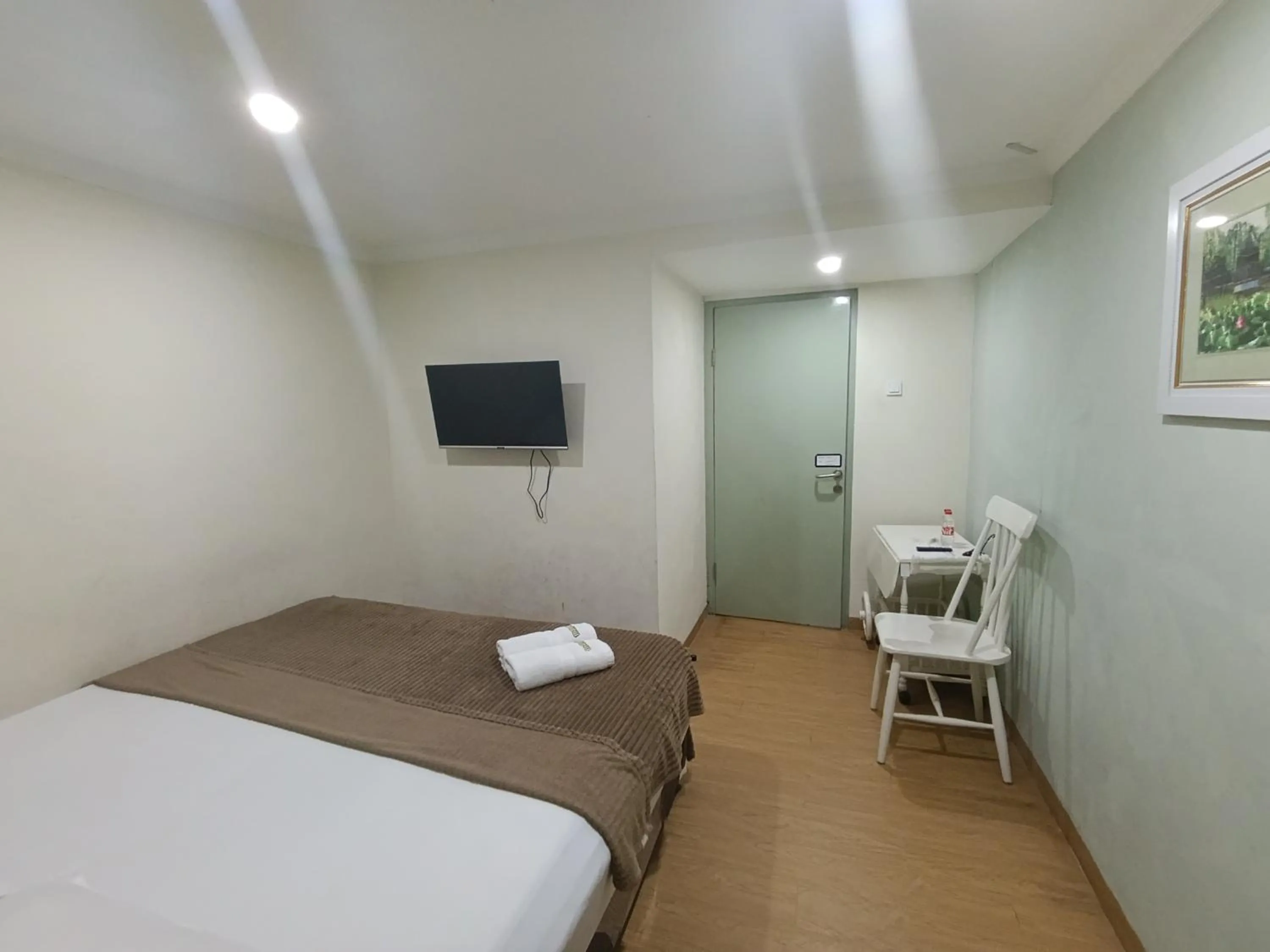 Bed in Mamifokobo Guest House