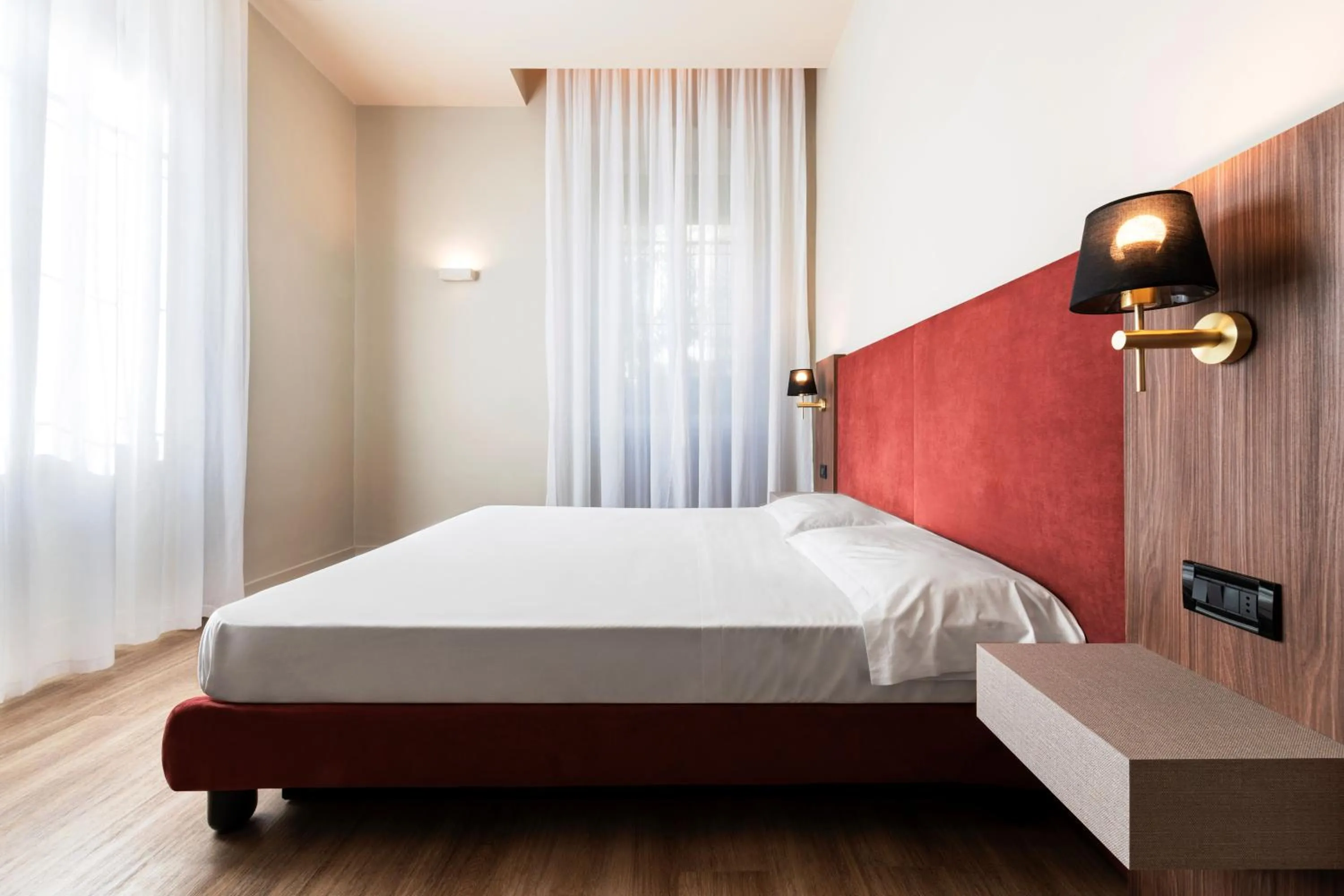 Bed in Mokinba Hotels Montebianco