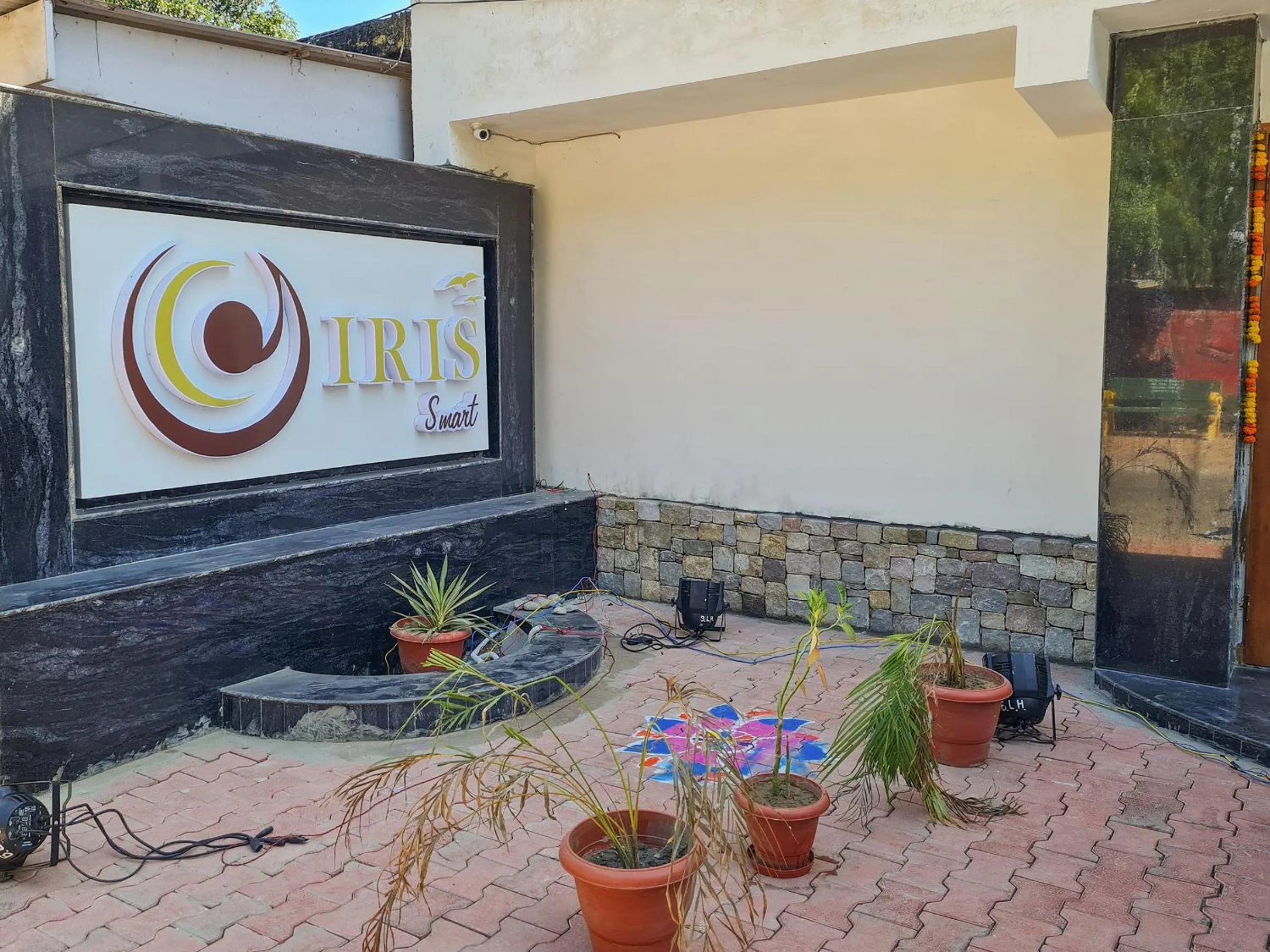 Property logo or sign in Iris Lite Corbett