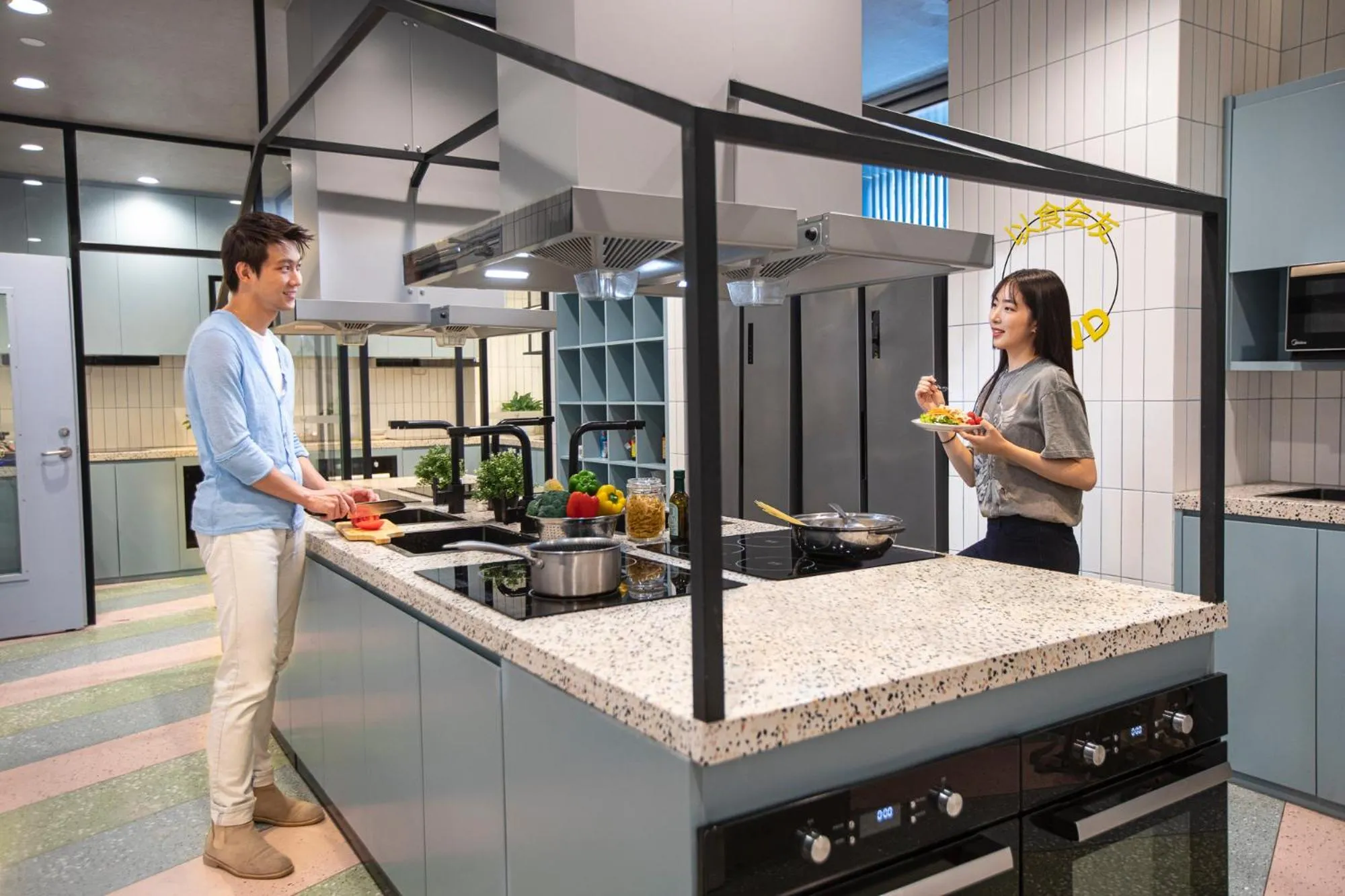 Communal kitchen in lyf by Ascott Hongqiao Shanghai NECC