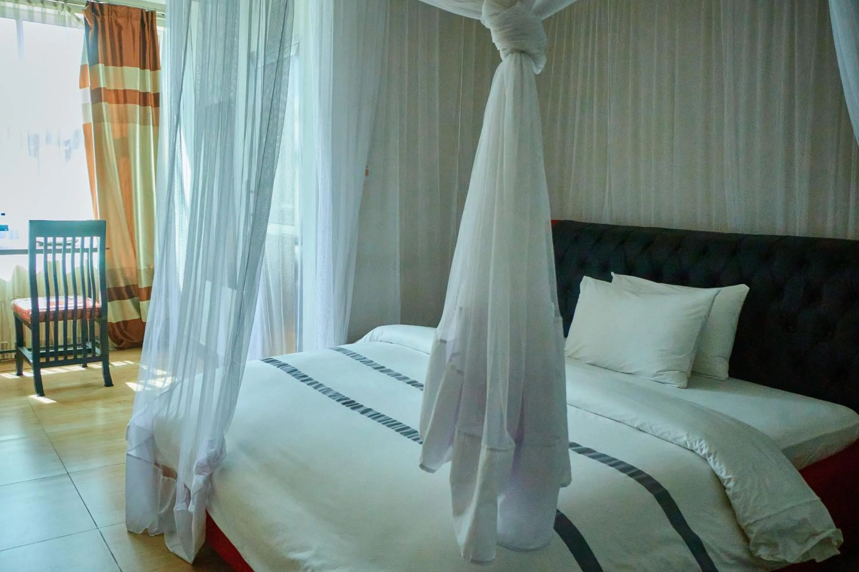 Bed in Elanacha Hotel