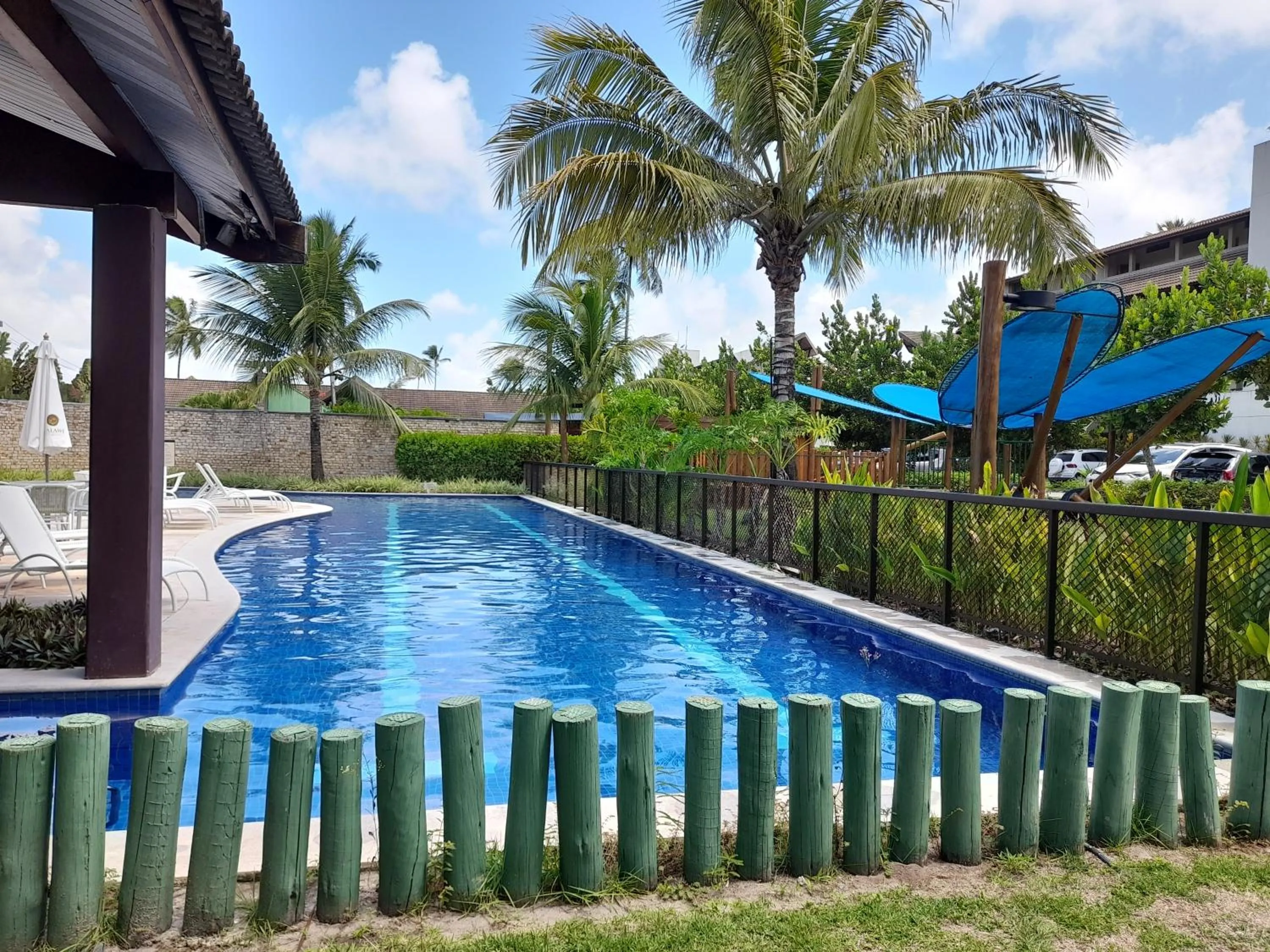 Swimming pool in Aconchegante Flat em condomínio na beira mar de Muro Alto - Malawi Beach Resort