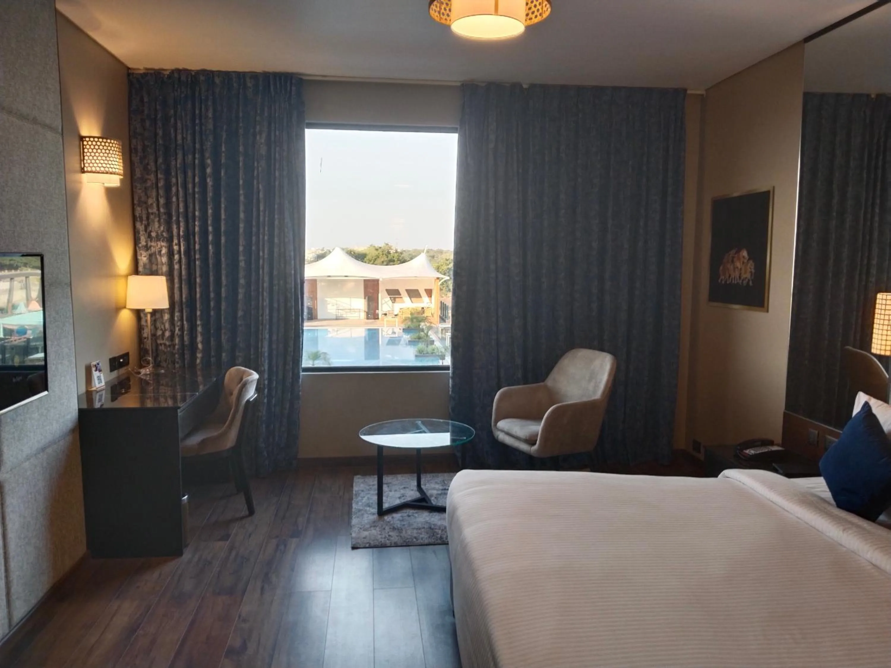 Photo of the whole room, Bed in Essentia Luxury Hotel Indore