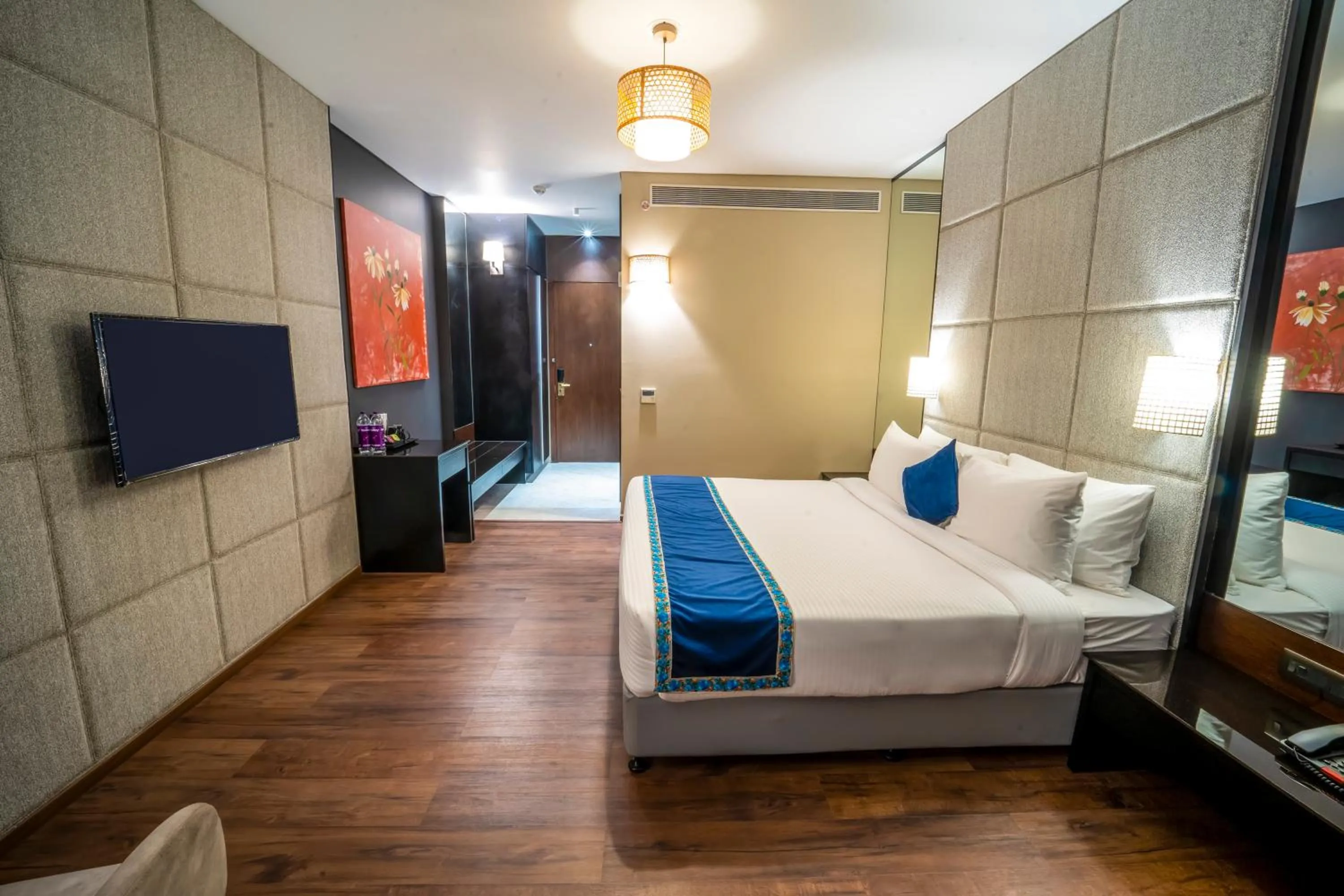 Bed in Essentia Luxury Hotel Indore