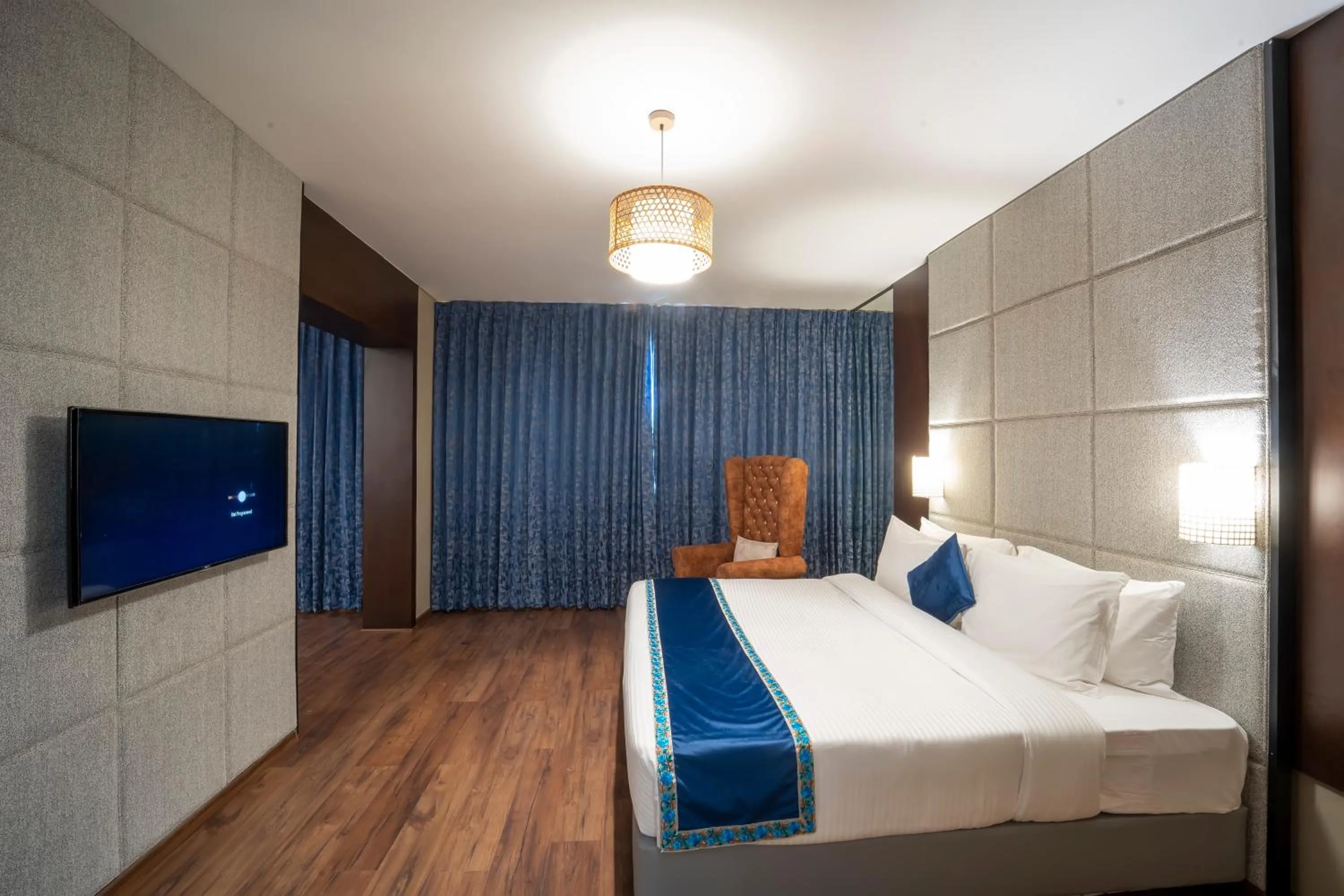 Photo of the whole room, Bed in Essentia Luxury Hotel Indore