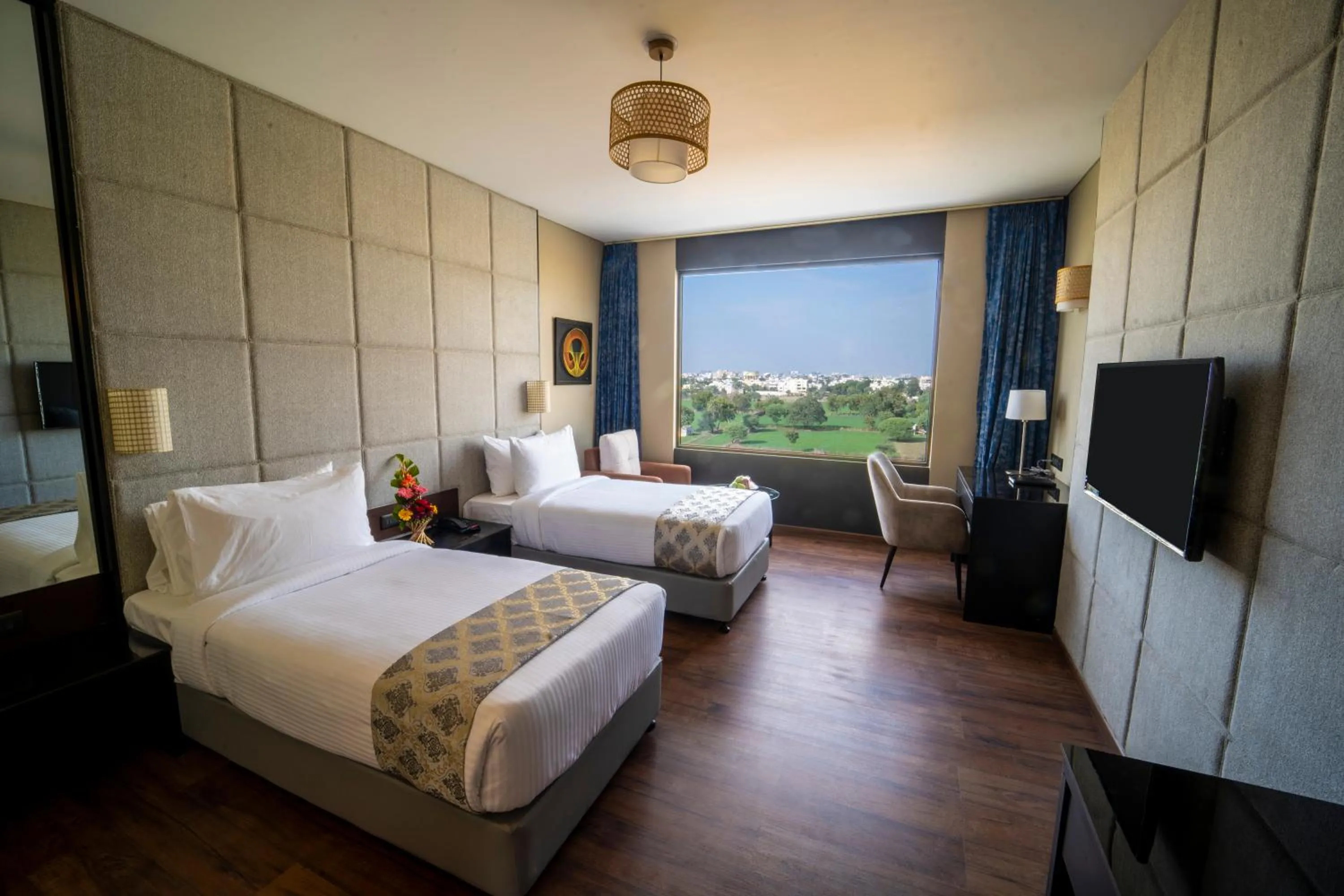 Photo of the whole room, Bed in Essentia Luxury Hotel Indore
