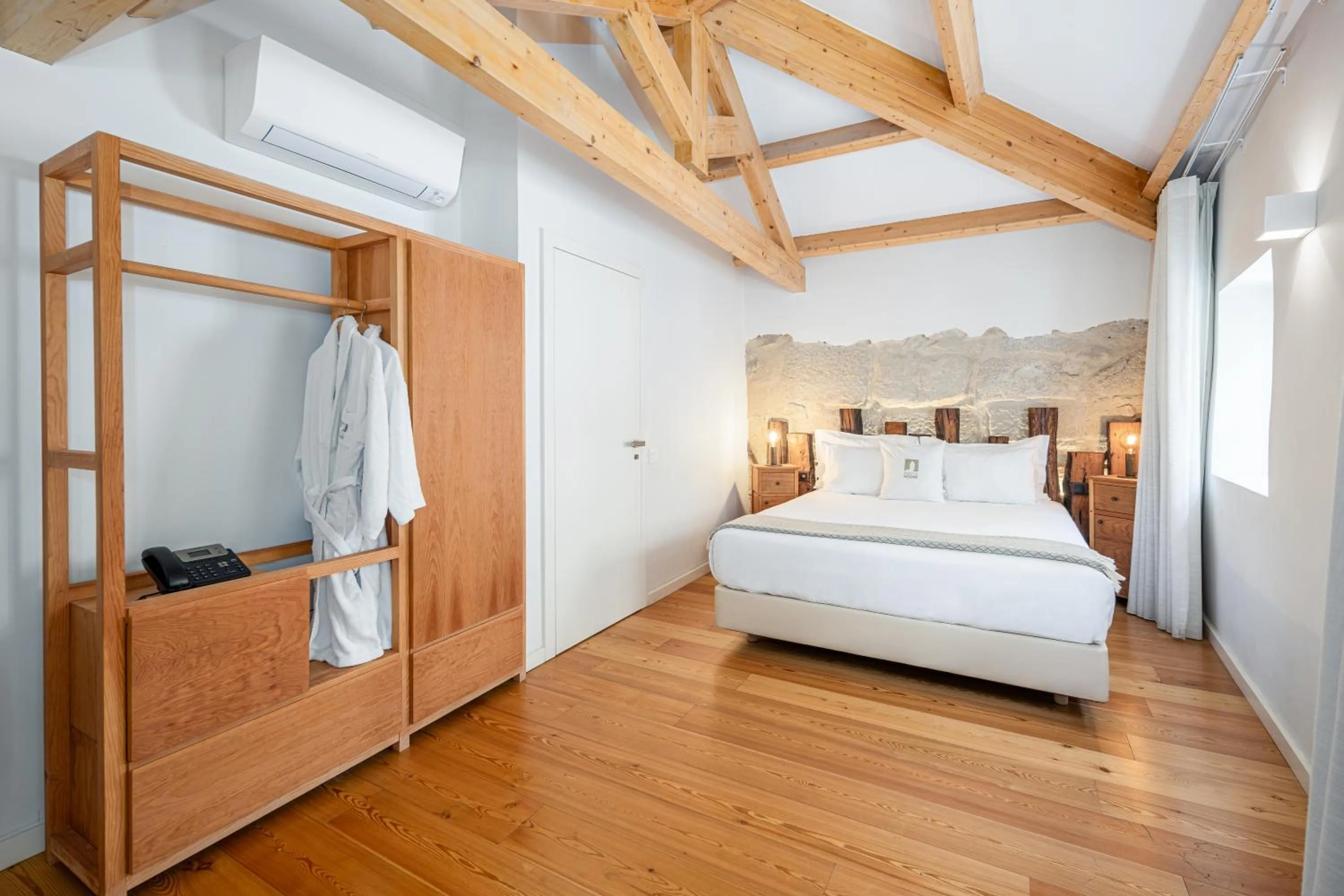 Bed in Porta Nobre Boutique Hotel by Aspasios