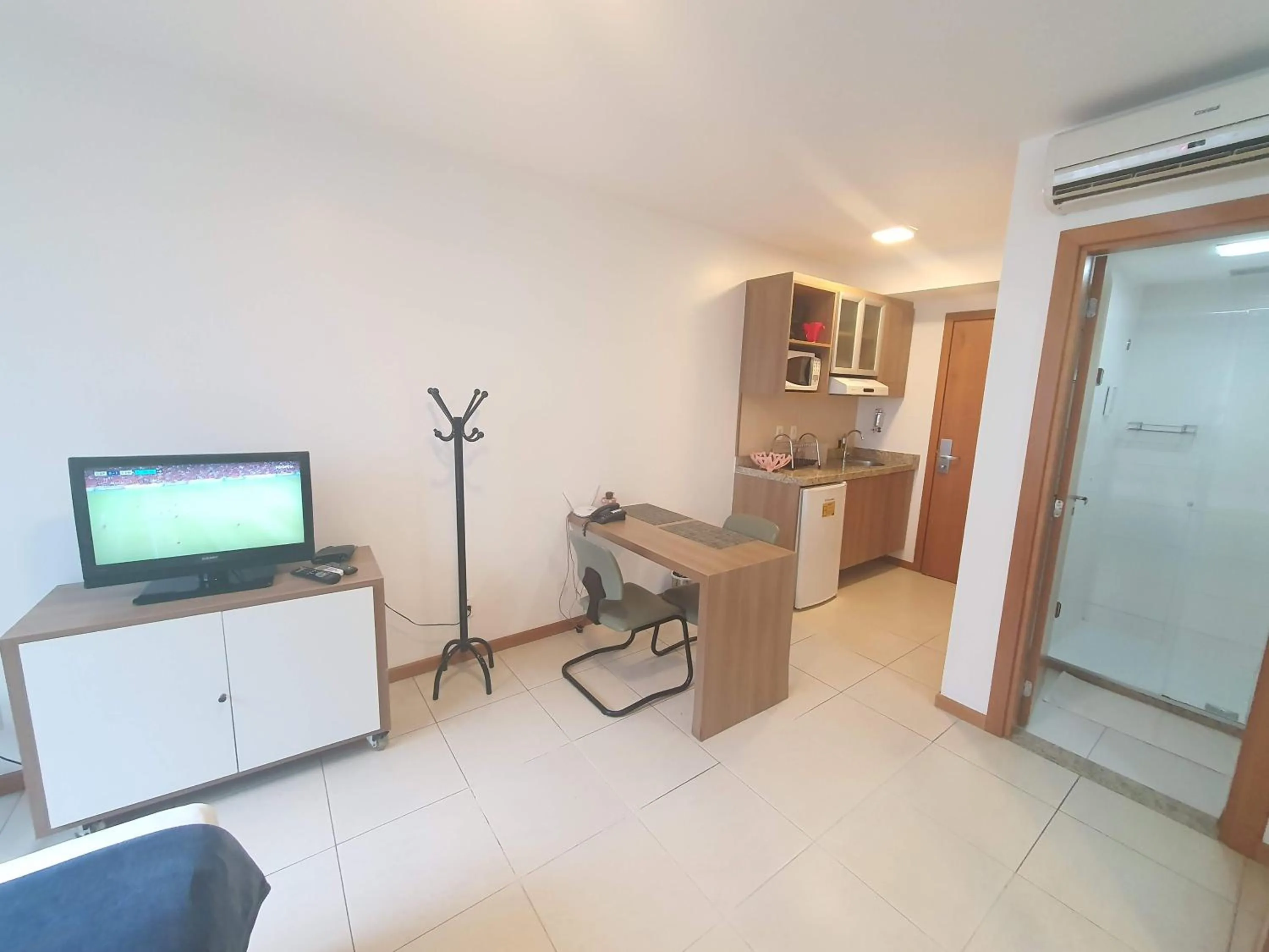 Communal lounge/ TV room in Flat Saint Moritz Express By Rei dos Flats