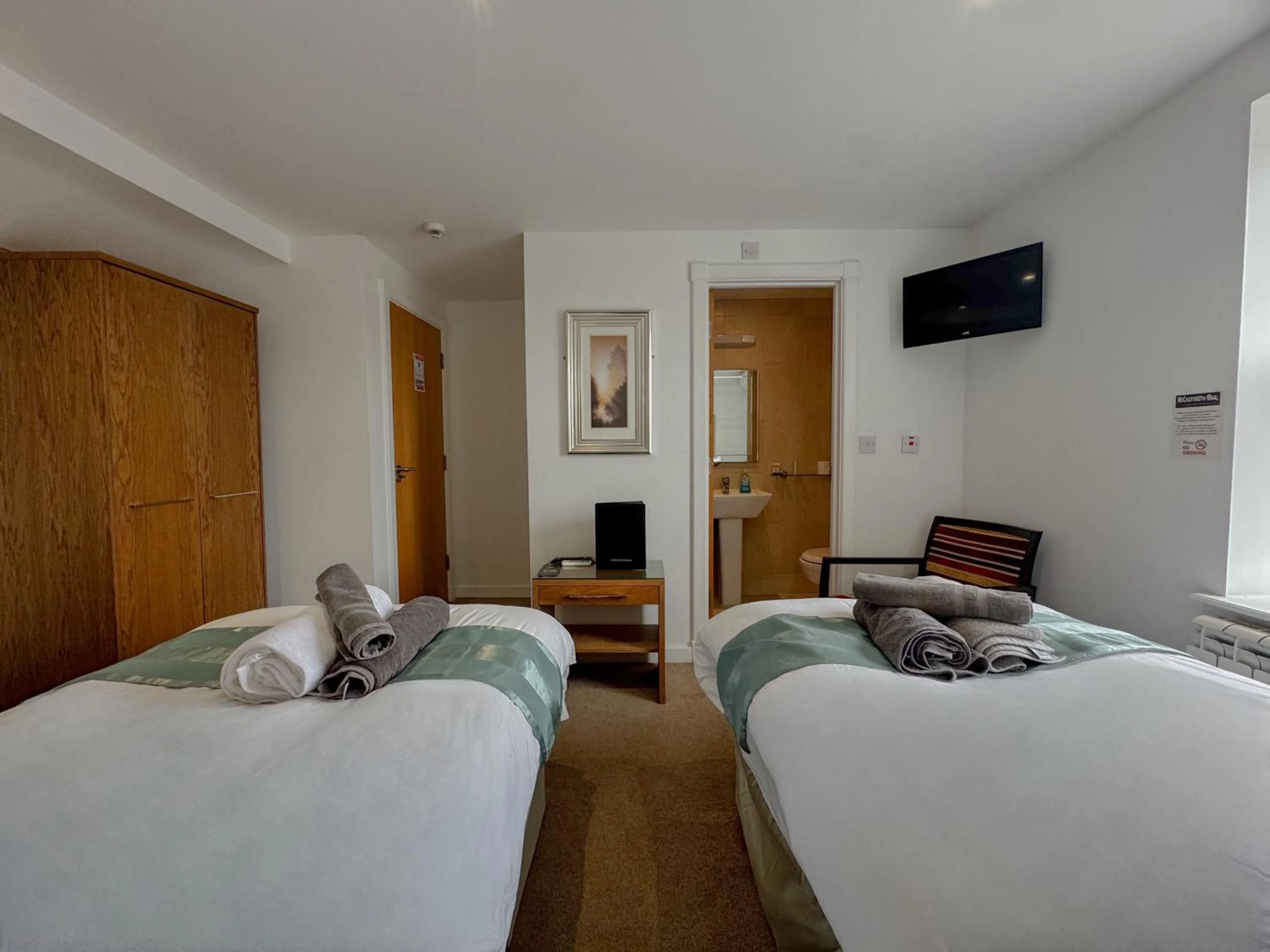 Bed in McCafferty's Guesthouse Ilford