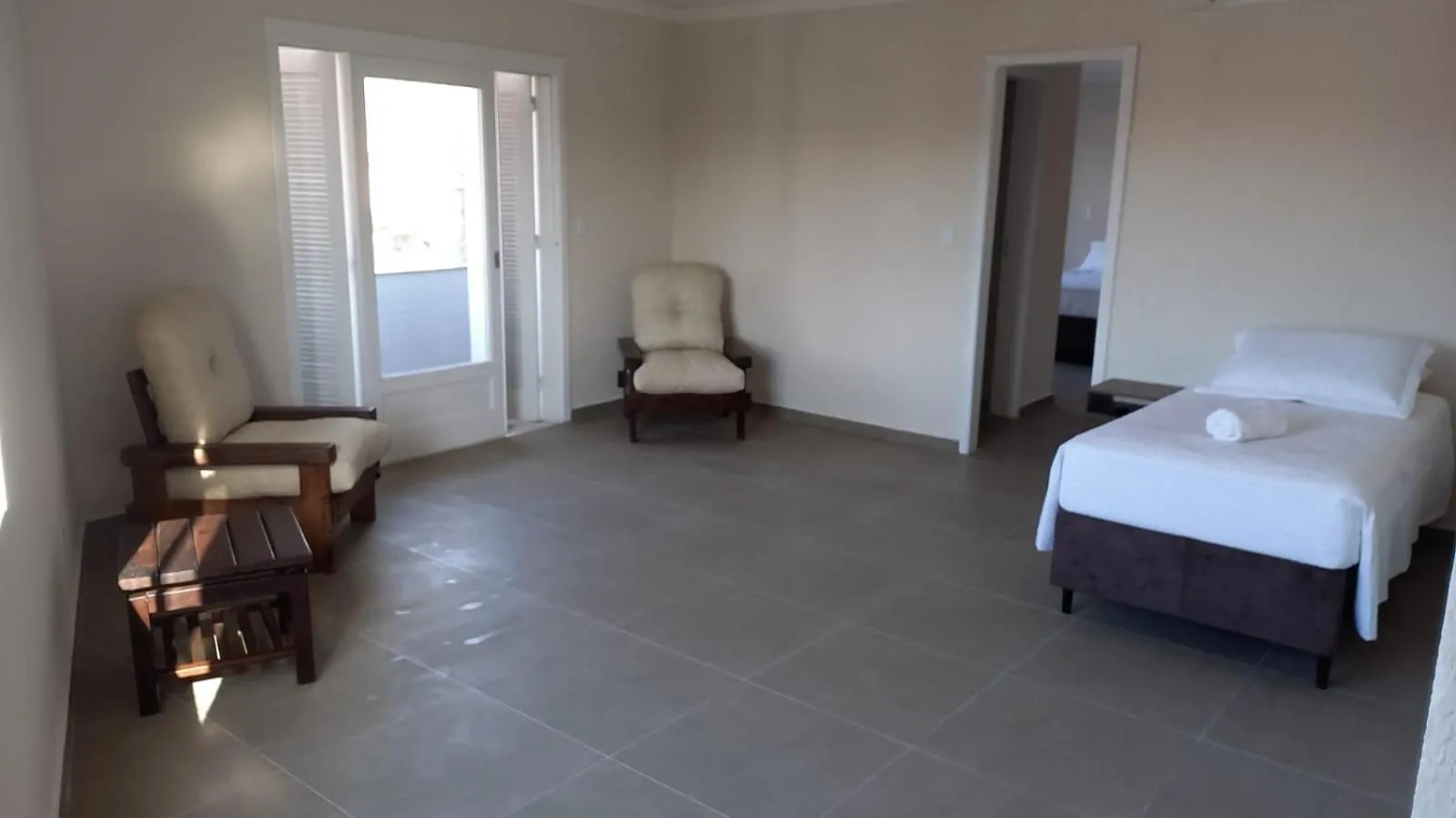 Living room, Bed in Hotel Kruger