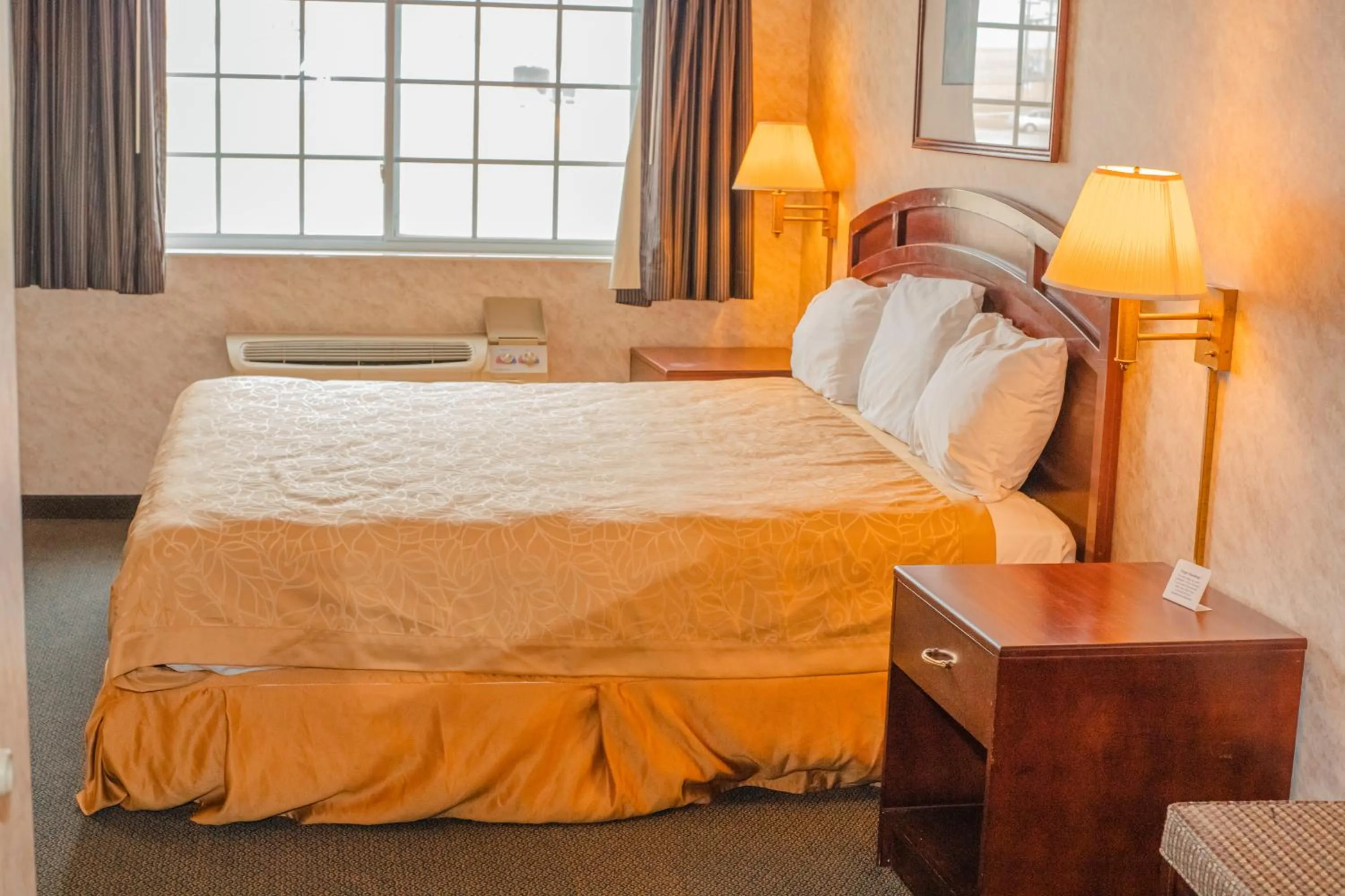 Bed in Colfax Inn By Marifah