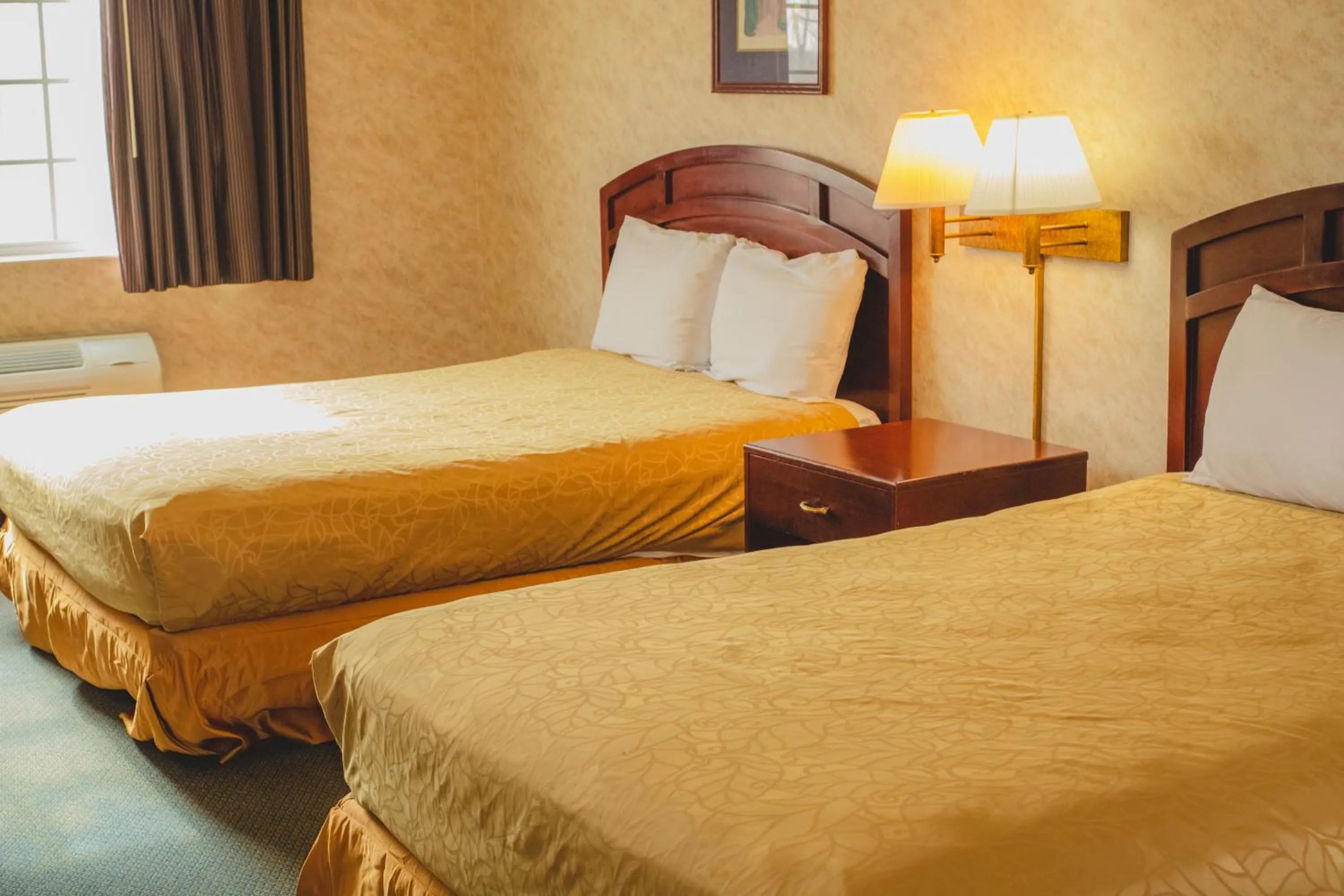 Bed in Colfax Inn By Marifah