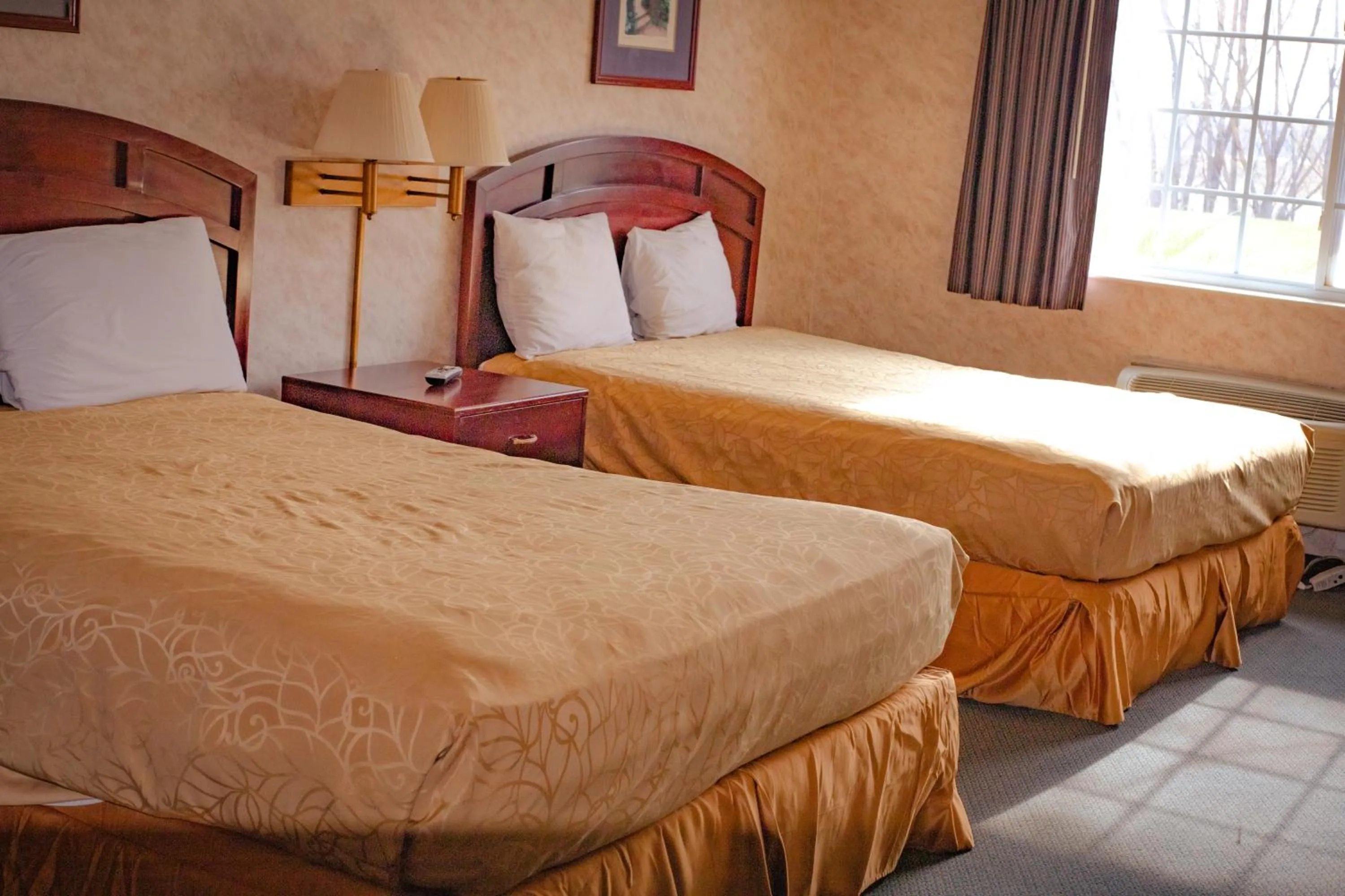 Bed in Colfax Inn By Marifah