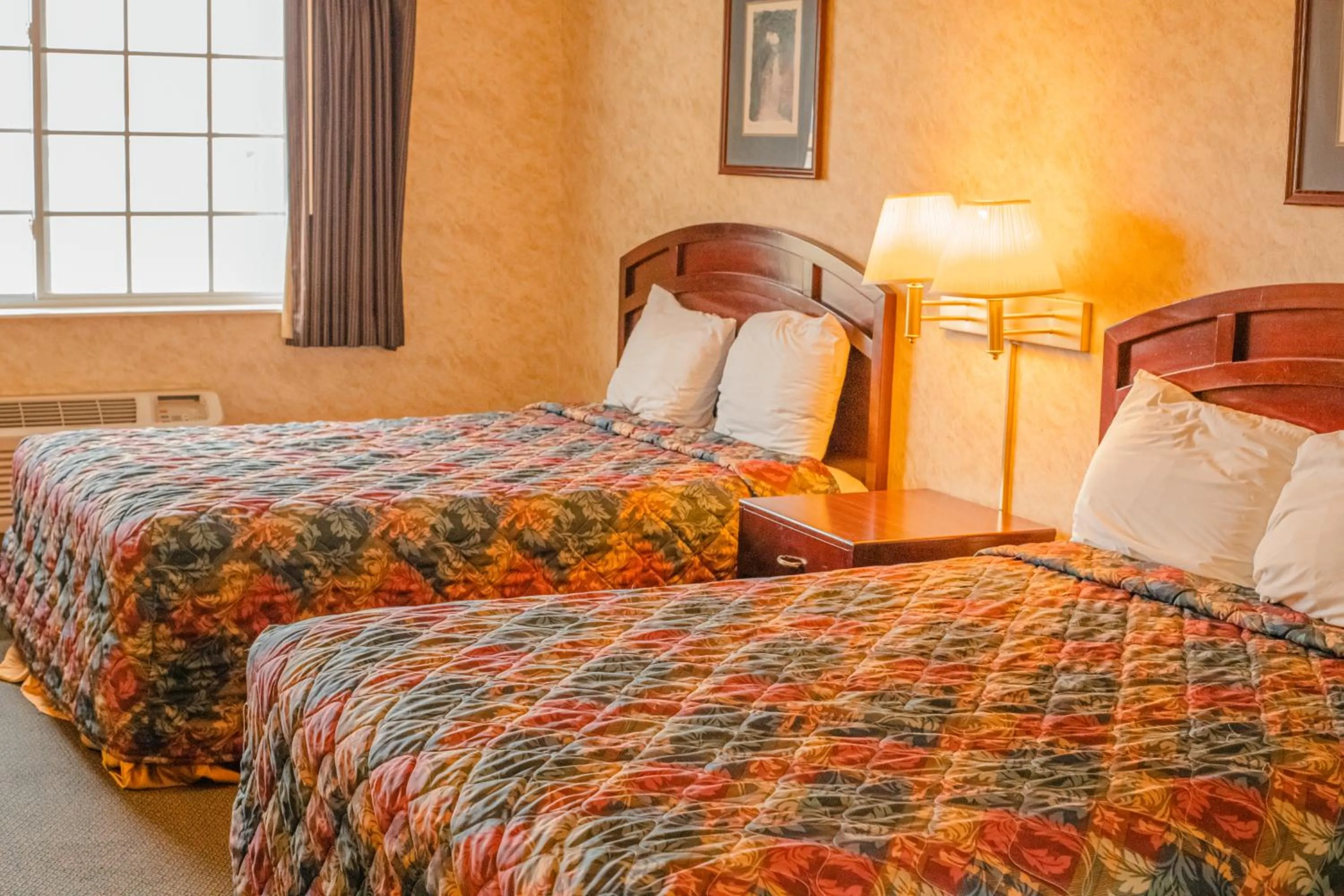 Bed in Colfax Inn By Marifah