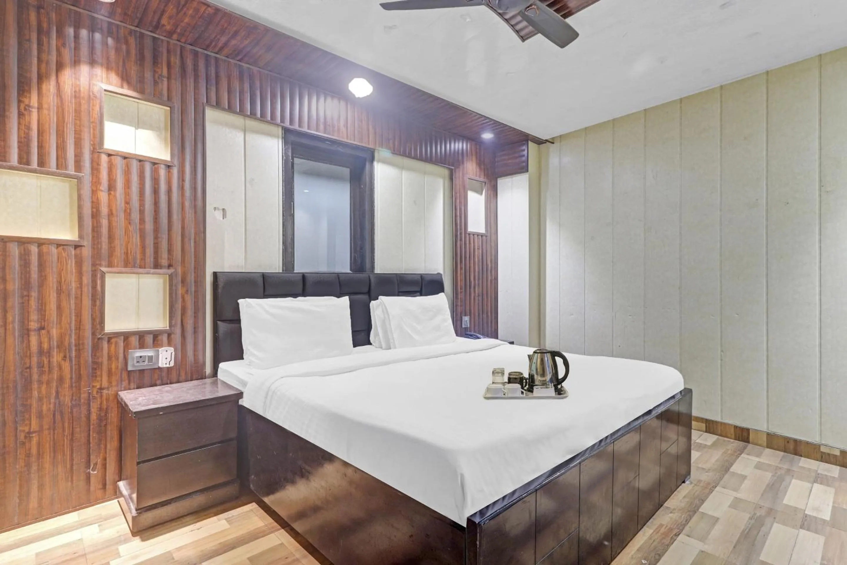 Bedroom in Hotel O Bhavya Residency