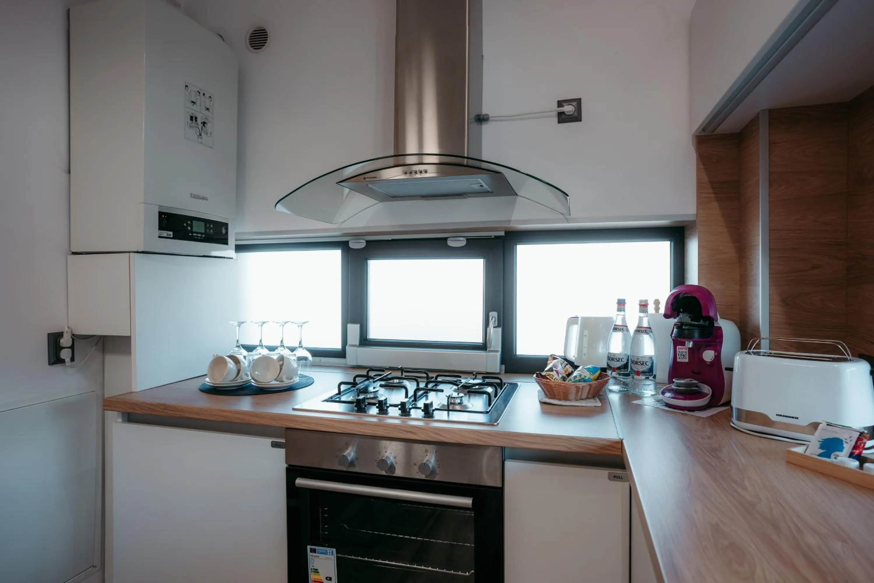 Kitchen or kitchenette in ResHome Apartments&Rooms