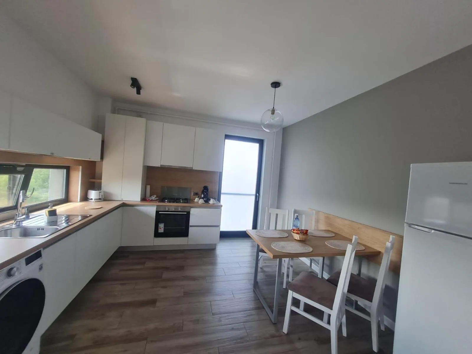 Kitchen or kitchenette in ResHome Apartments&Rooms