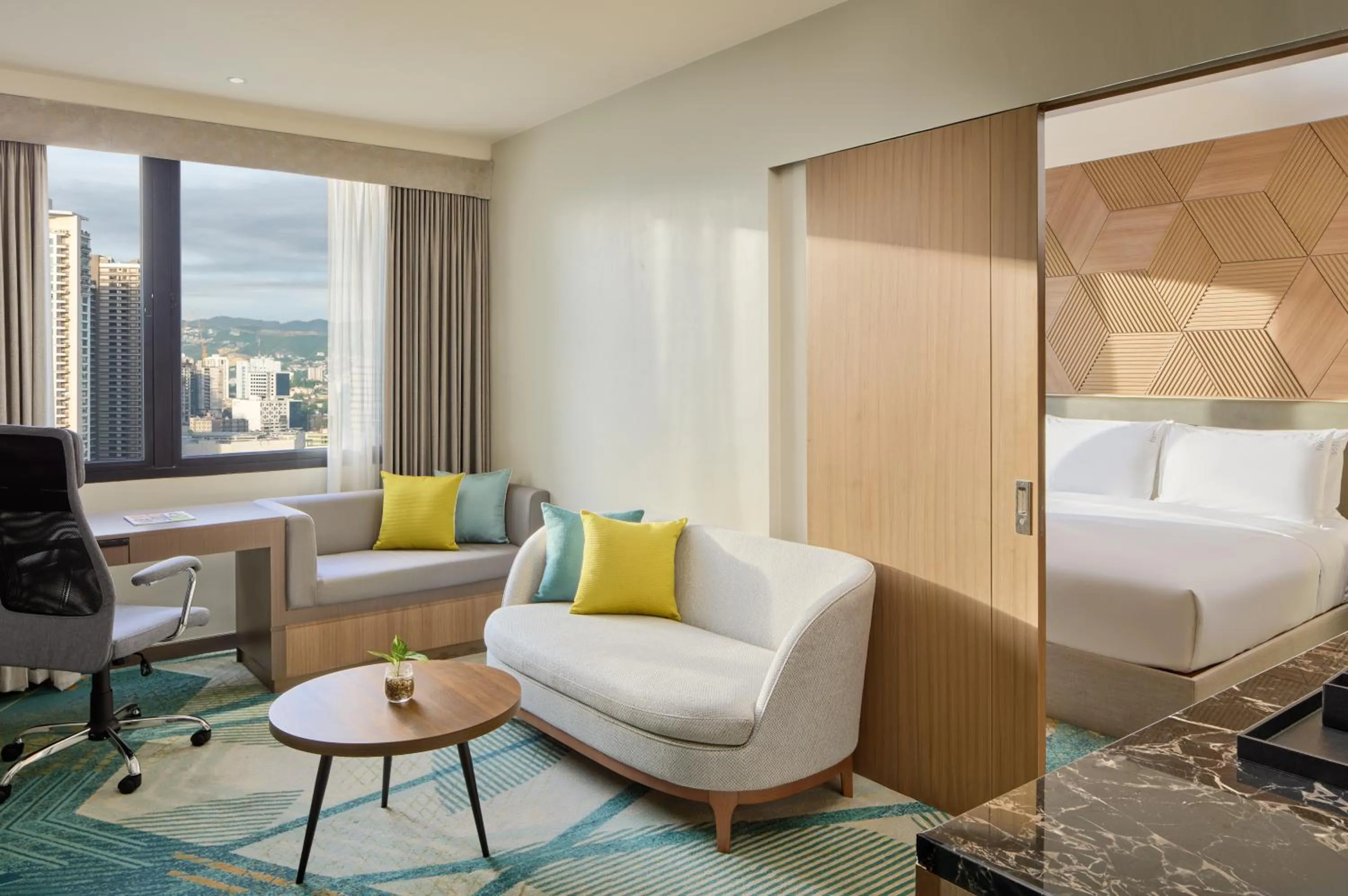 Living room, Bed in Holiday Inn Cebu City by IHG